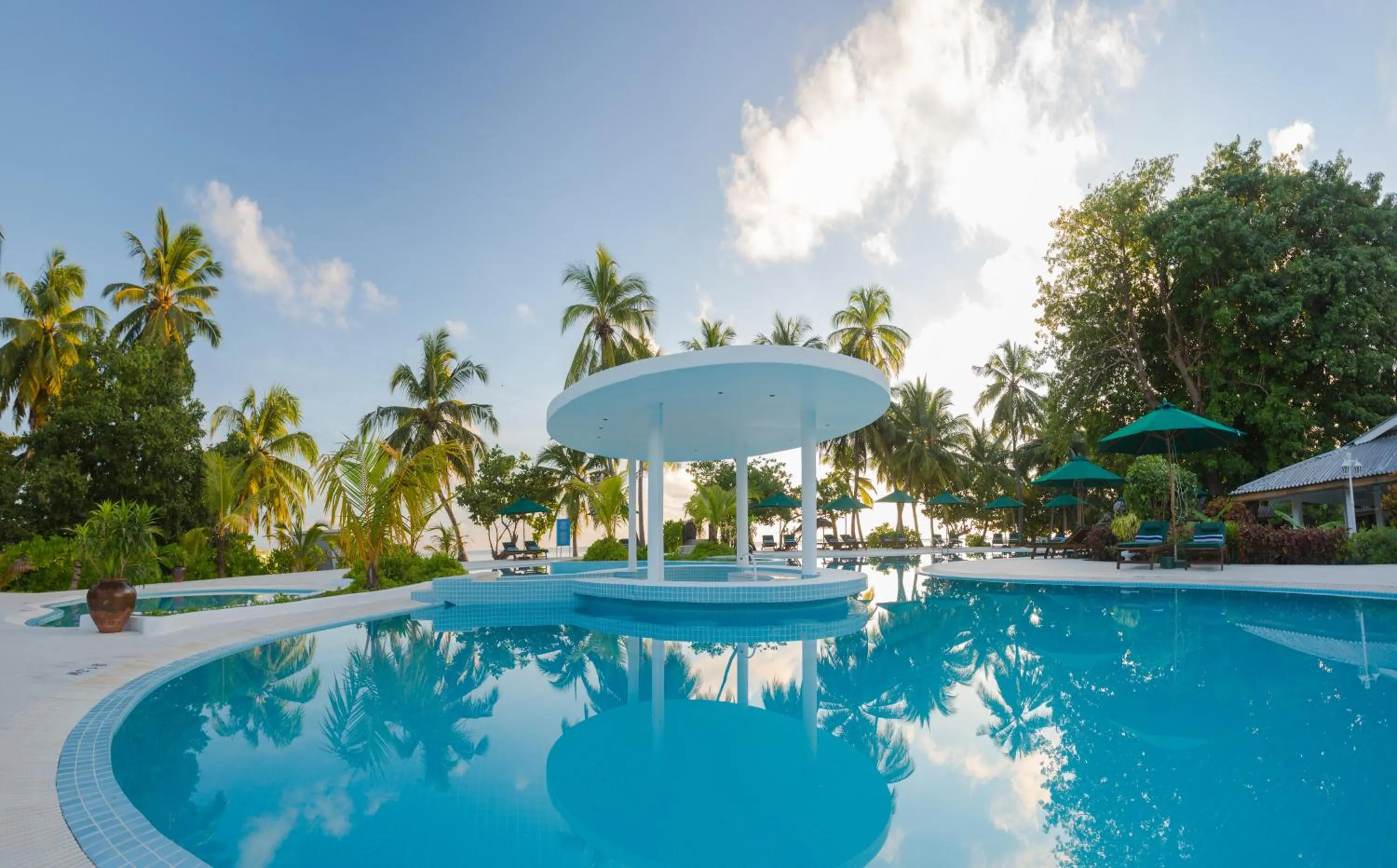 Pool view in Equator Village Maldives