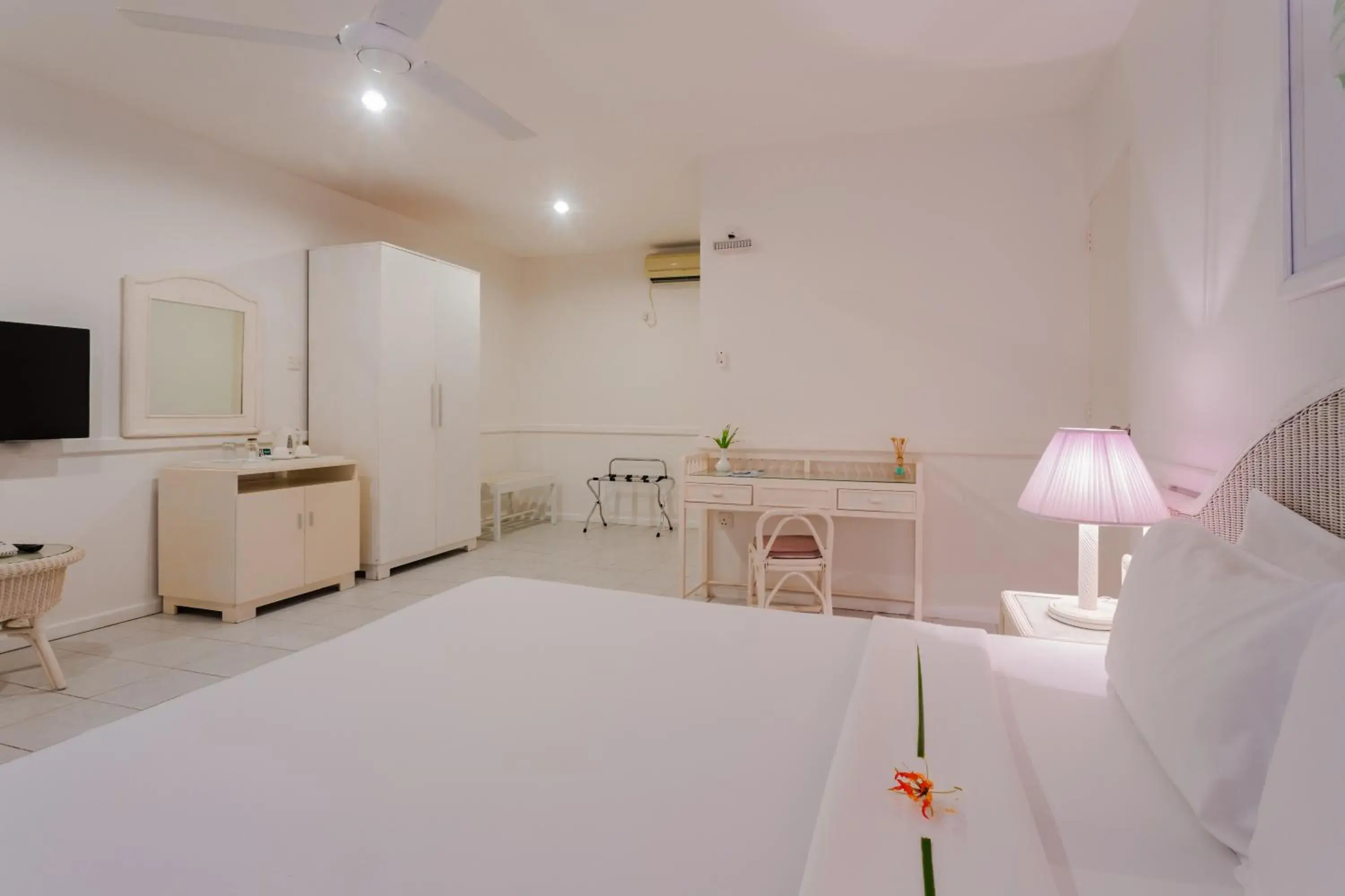 Bed in Equator Village Maldives Bed in Equator Village Maldives