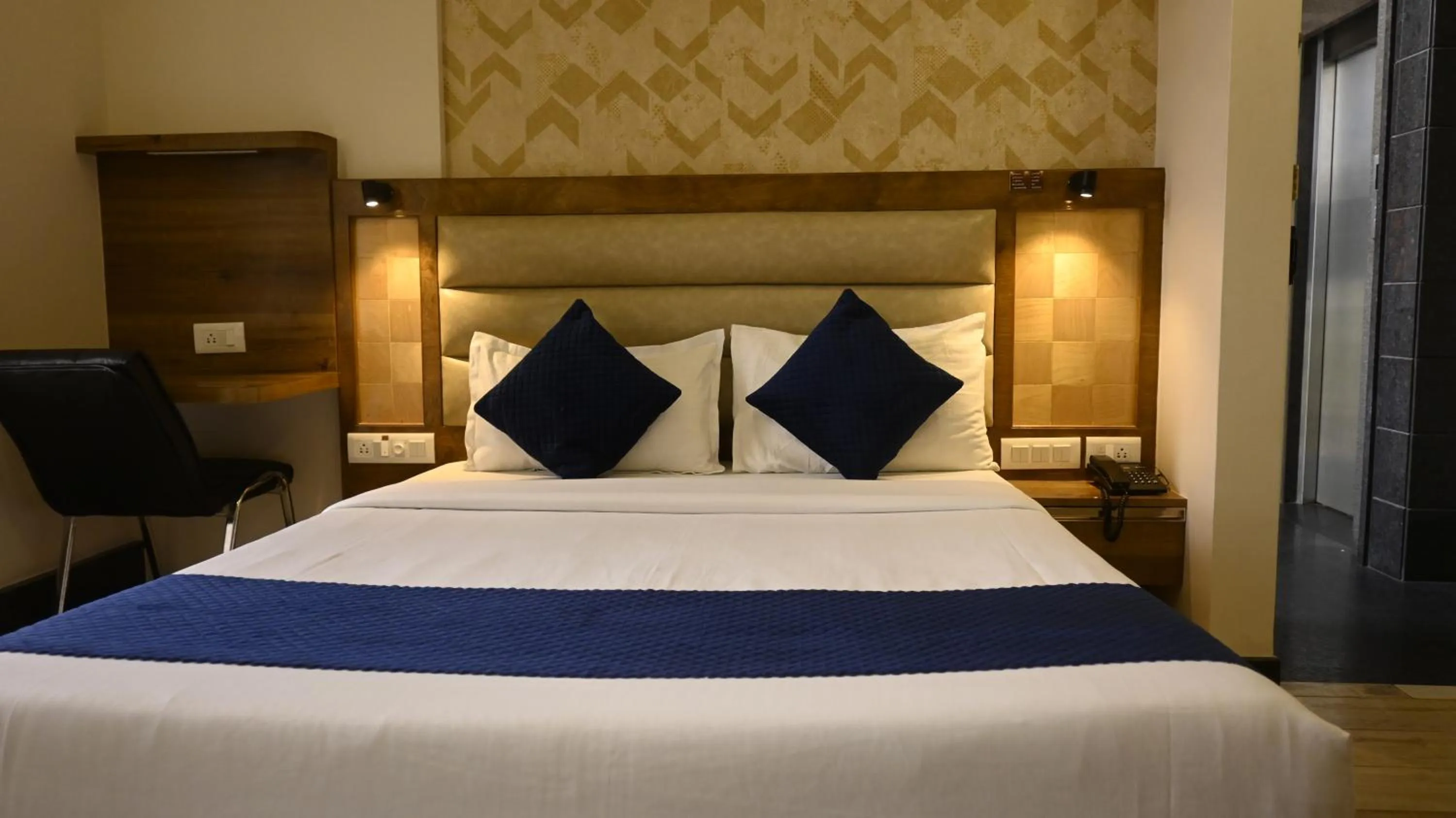 Bed in Hotel Rize Inn