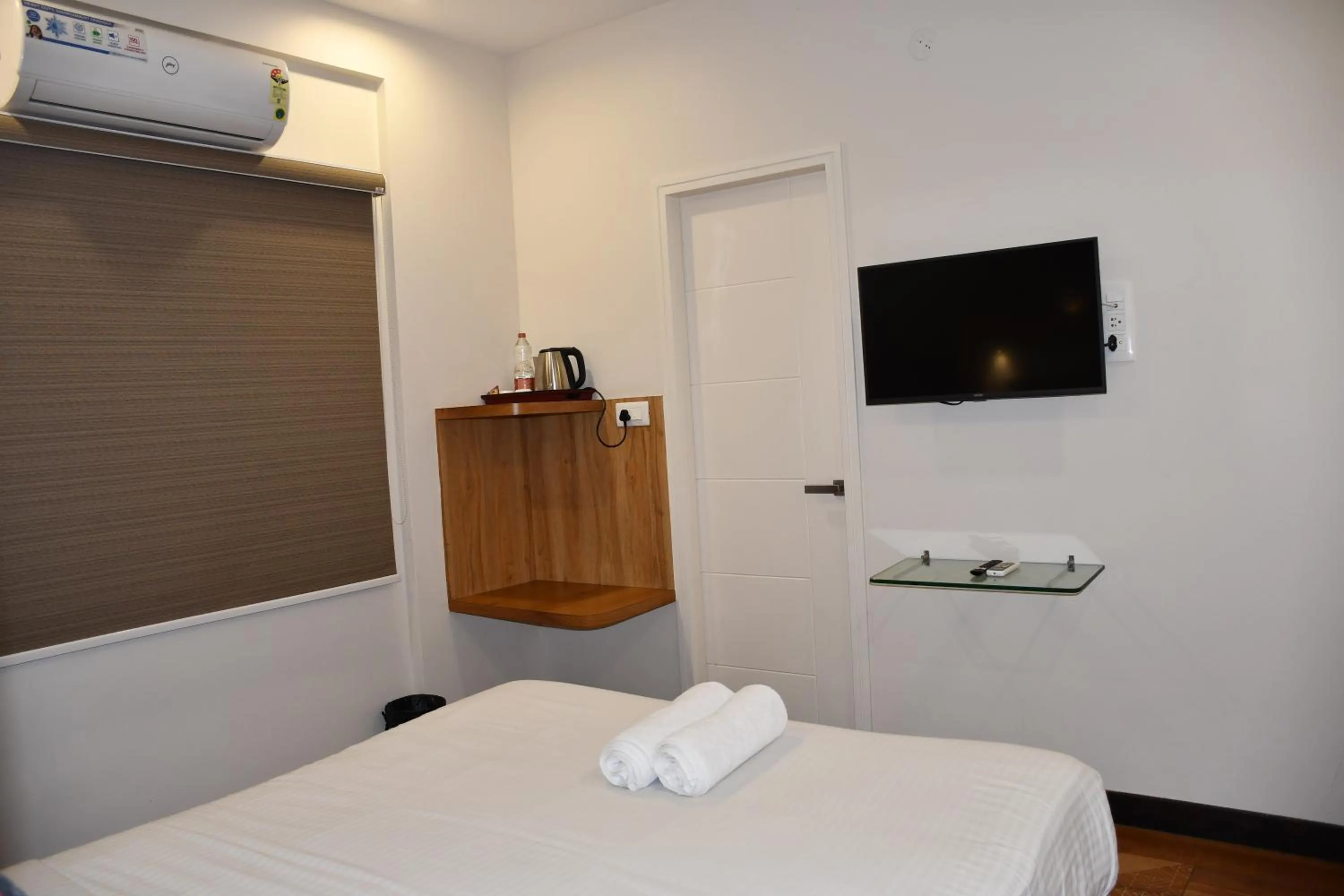 Bed in Hotel Rize Inn