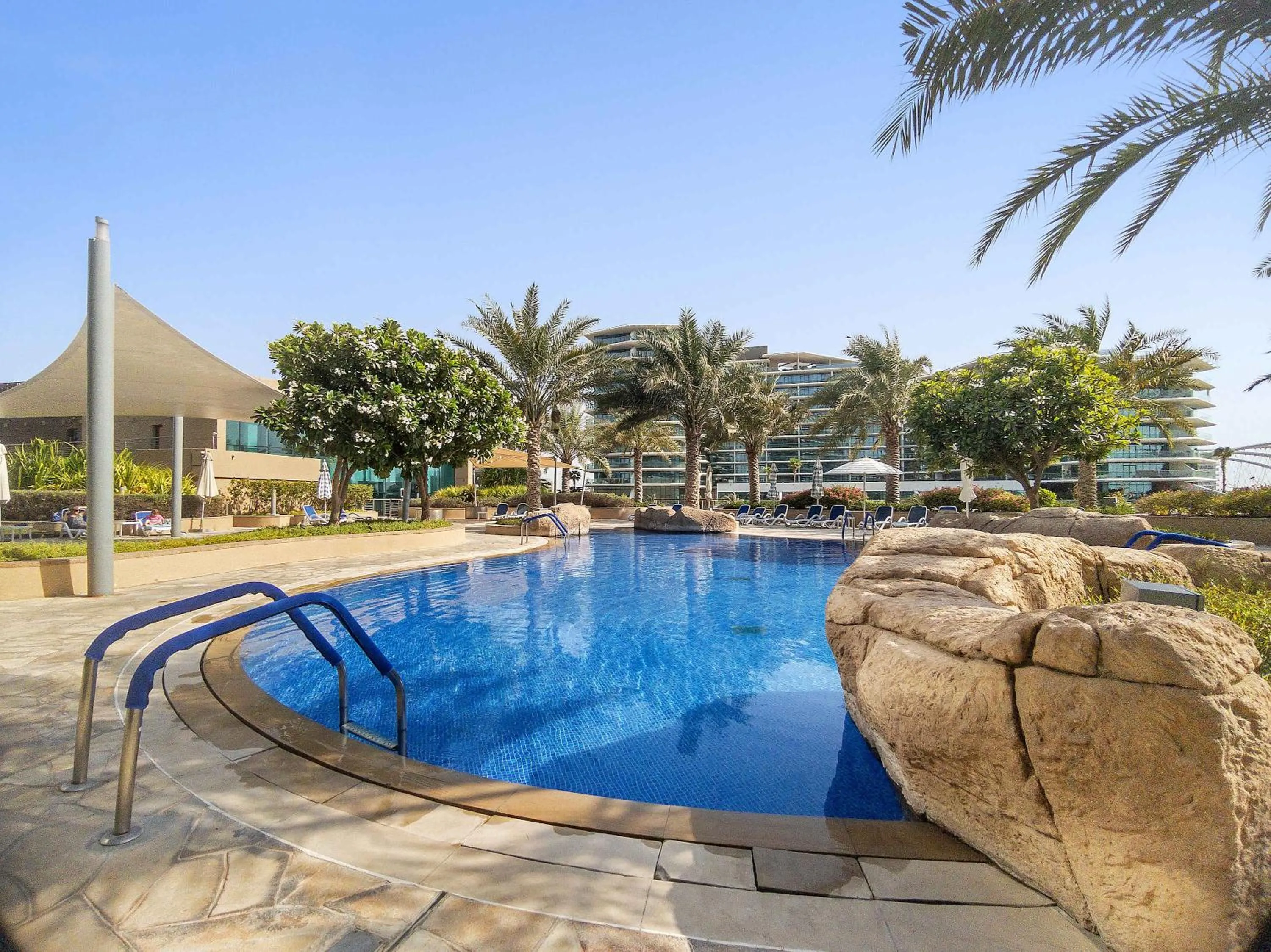 Swimming pool in Silkhaus Vacation Homes Chic 1BDR at Al Bandar in Al Naseem A
