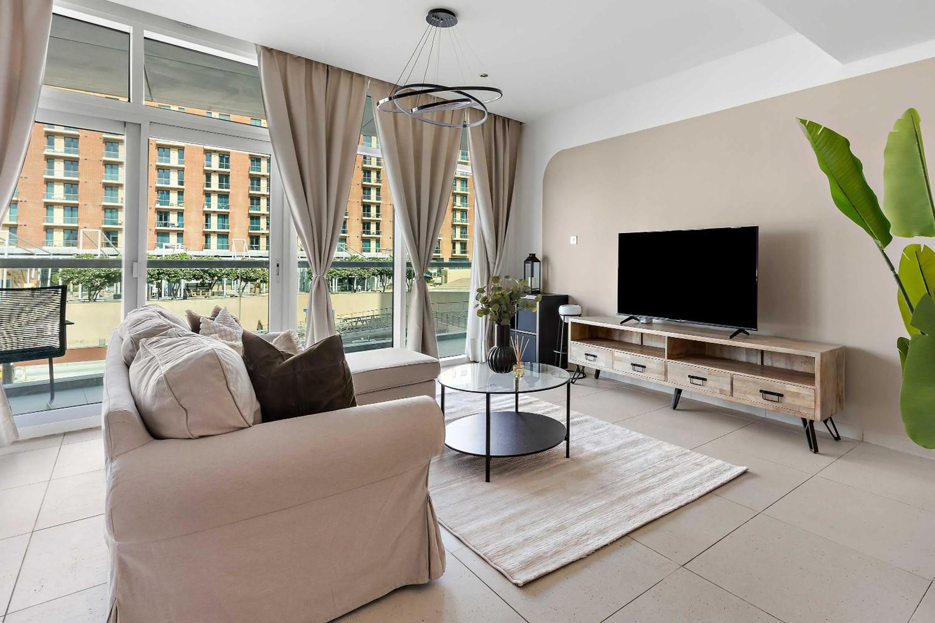 TV and multimedia in Silkhaus Vacation Homes Chic 1BDR at Al Bandar in Al Naseem A