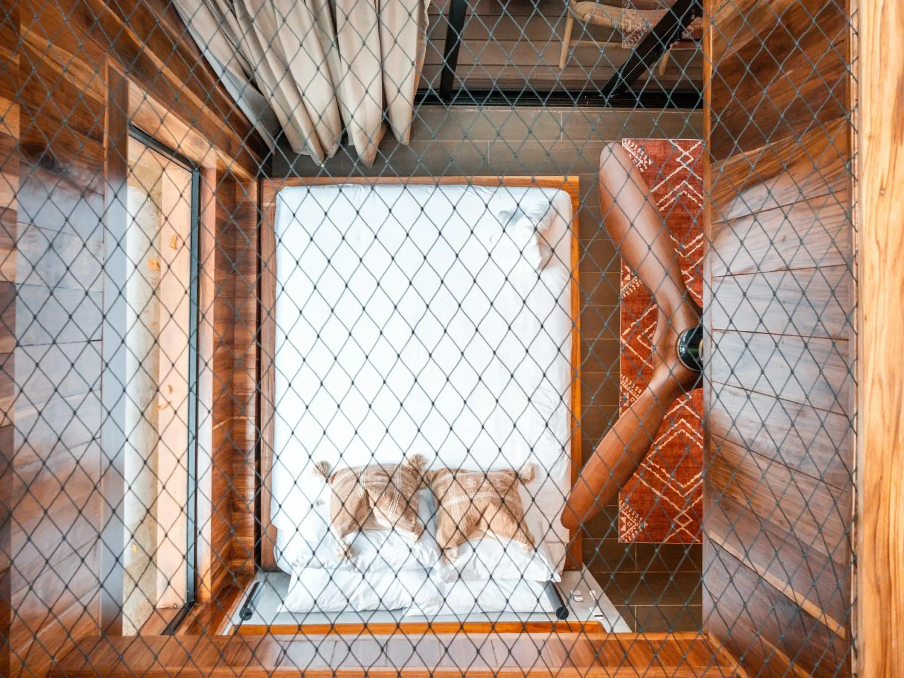 Bed in Palmar Beach Lodge Bed in Palmar Beach Lodge