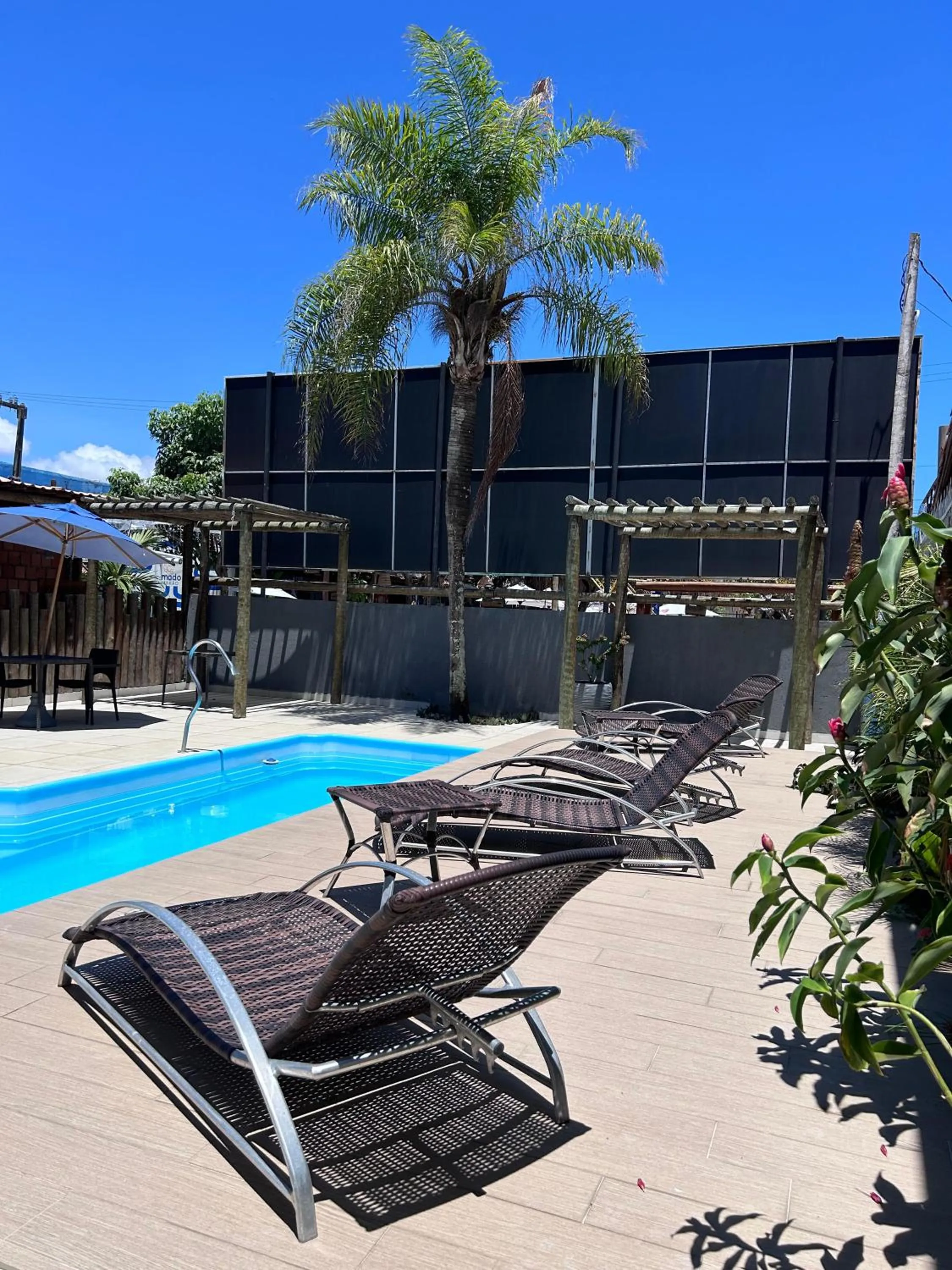 Swimming pool in Pousada Aconchego