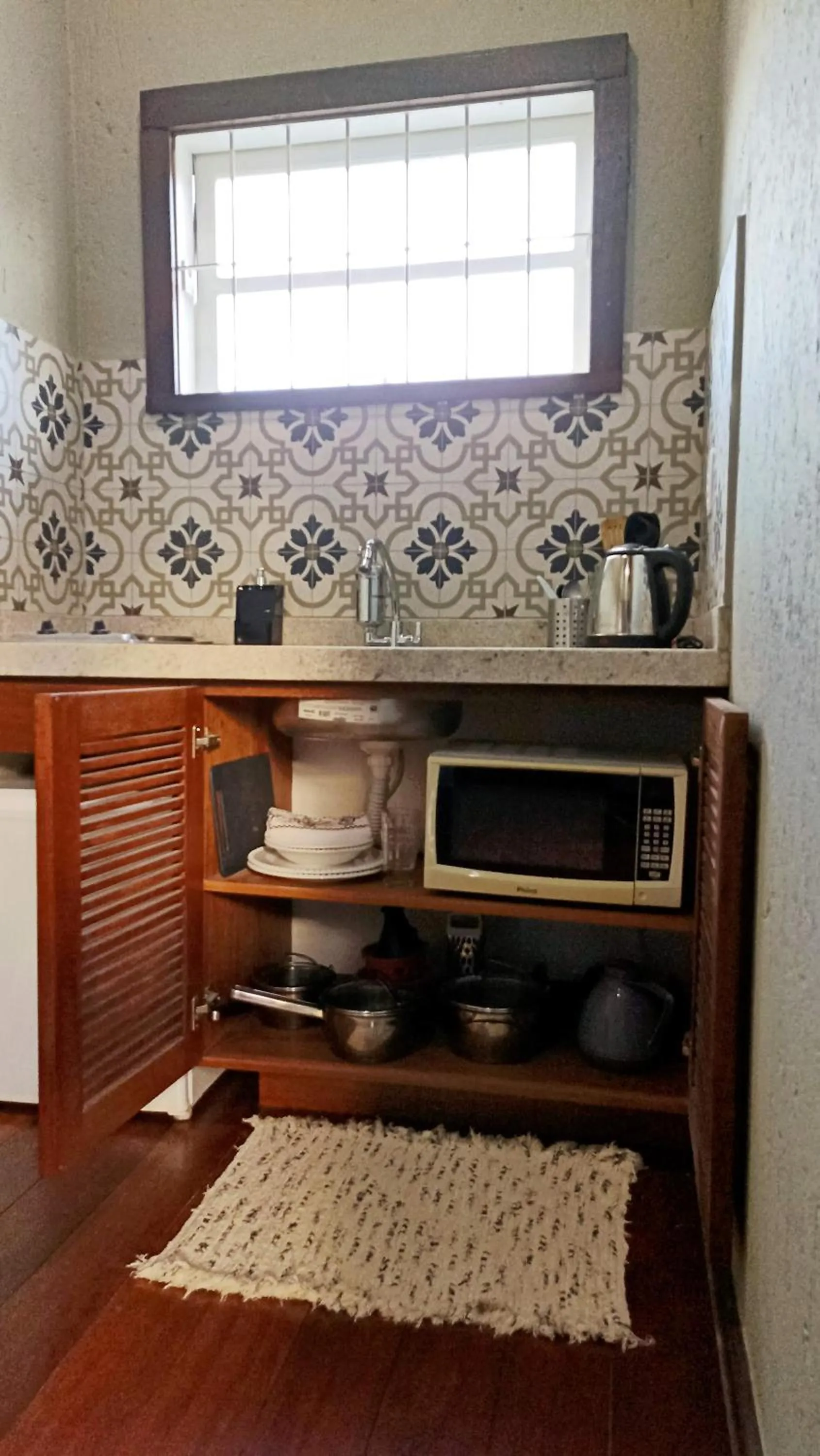 Kitchen or kitchenette in Solar das Pétalas Guest House