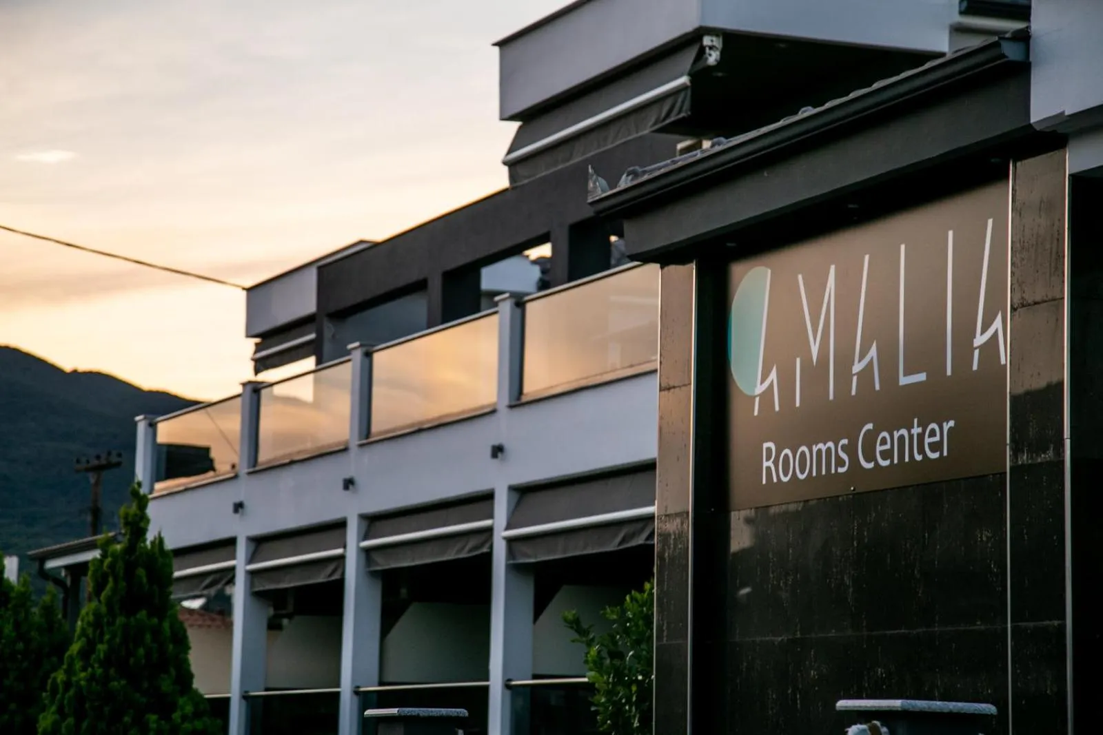 Property logo or sign in Amalia Center