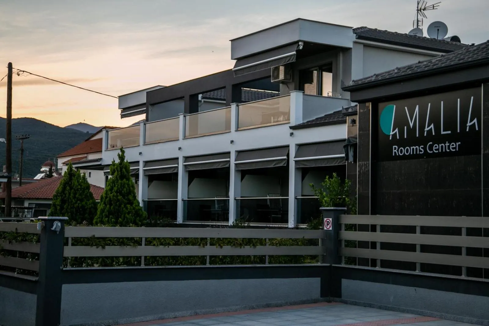 Property logo or sign in Amalia Center