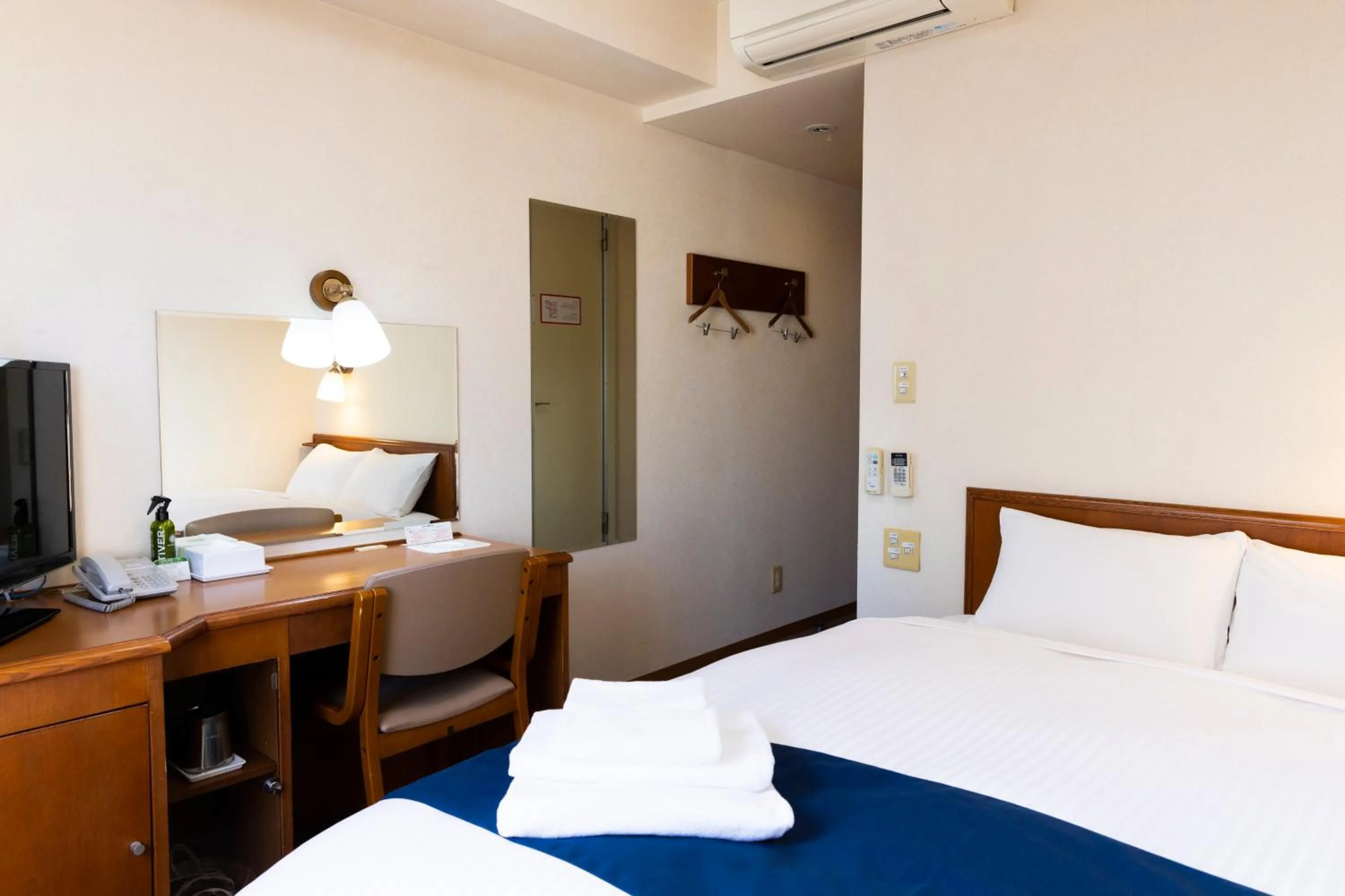 Bed in Natural Hot Spring Ariston Hotel Oita