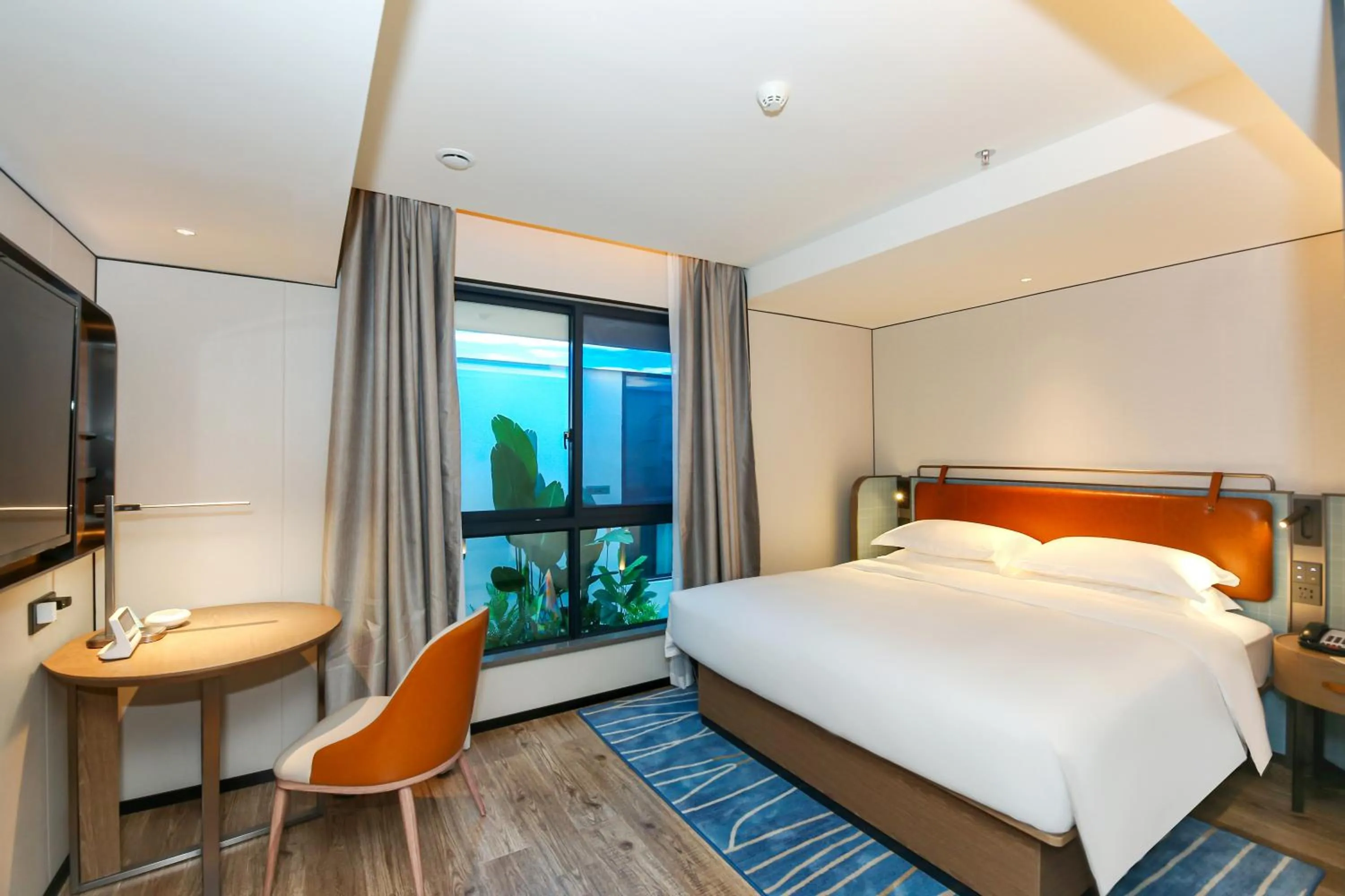 Bed in Echarm Plus International Hotel Guangzhou South Railway Station Zhongcun Metro Station Branch