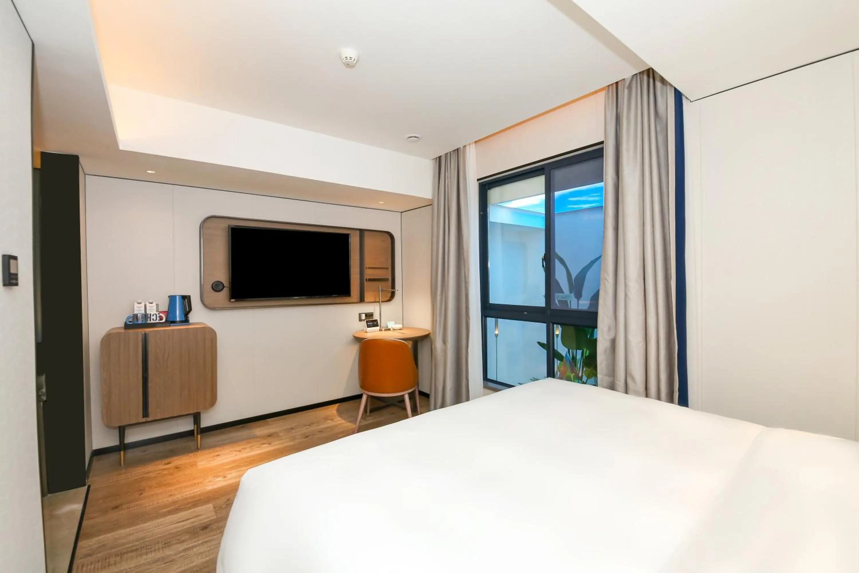 Bed in Echarm Plus International Hotel Guangzhou South Railway Station Zhongcun Metro Station Branch