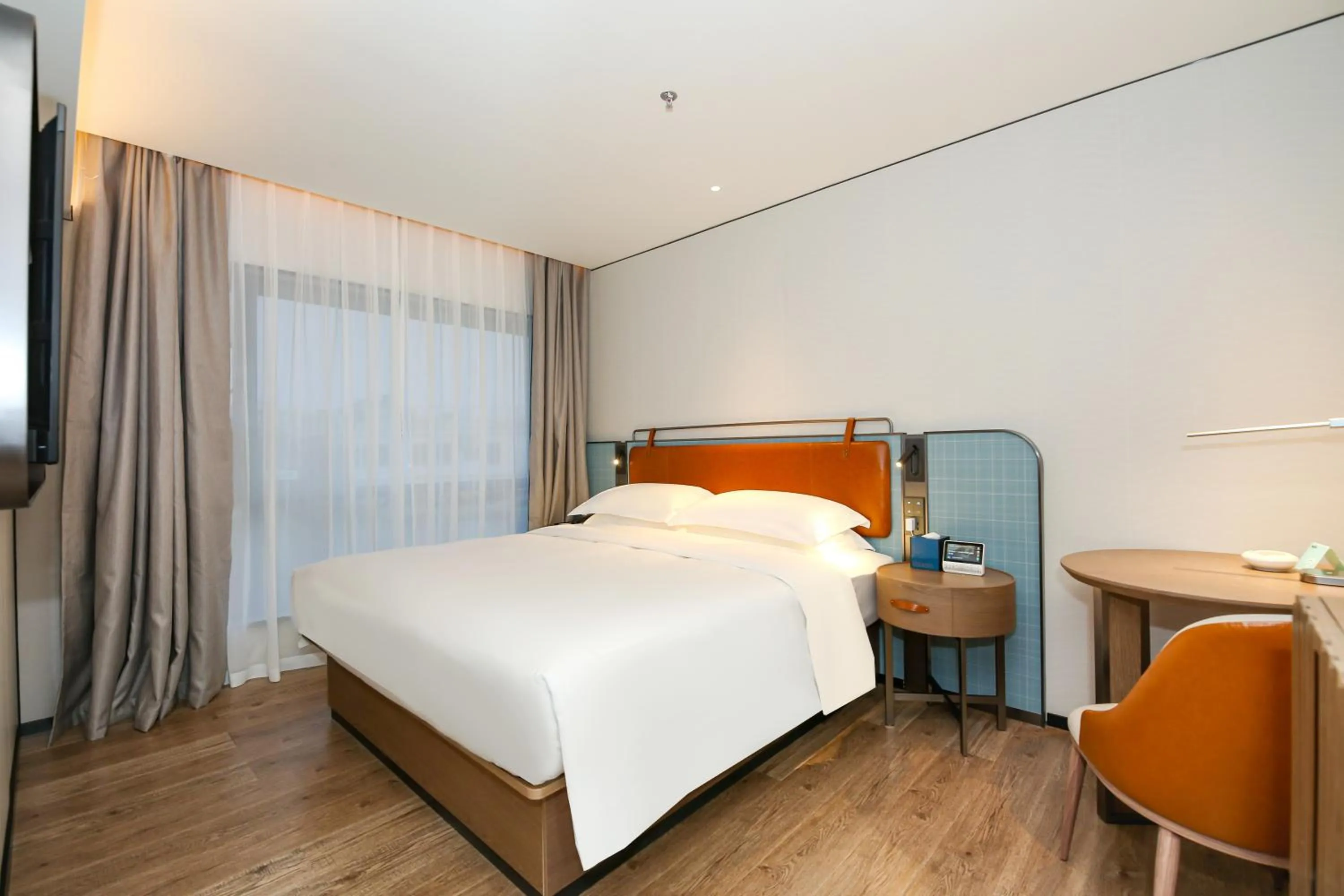 Bed in Echarm Plus International Hotel Guangzhou South Railway Station Zhongcun Metro Station Branch