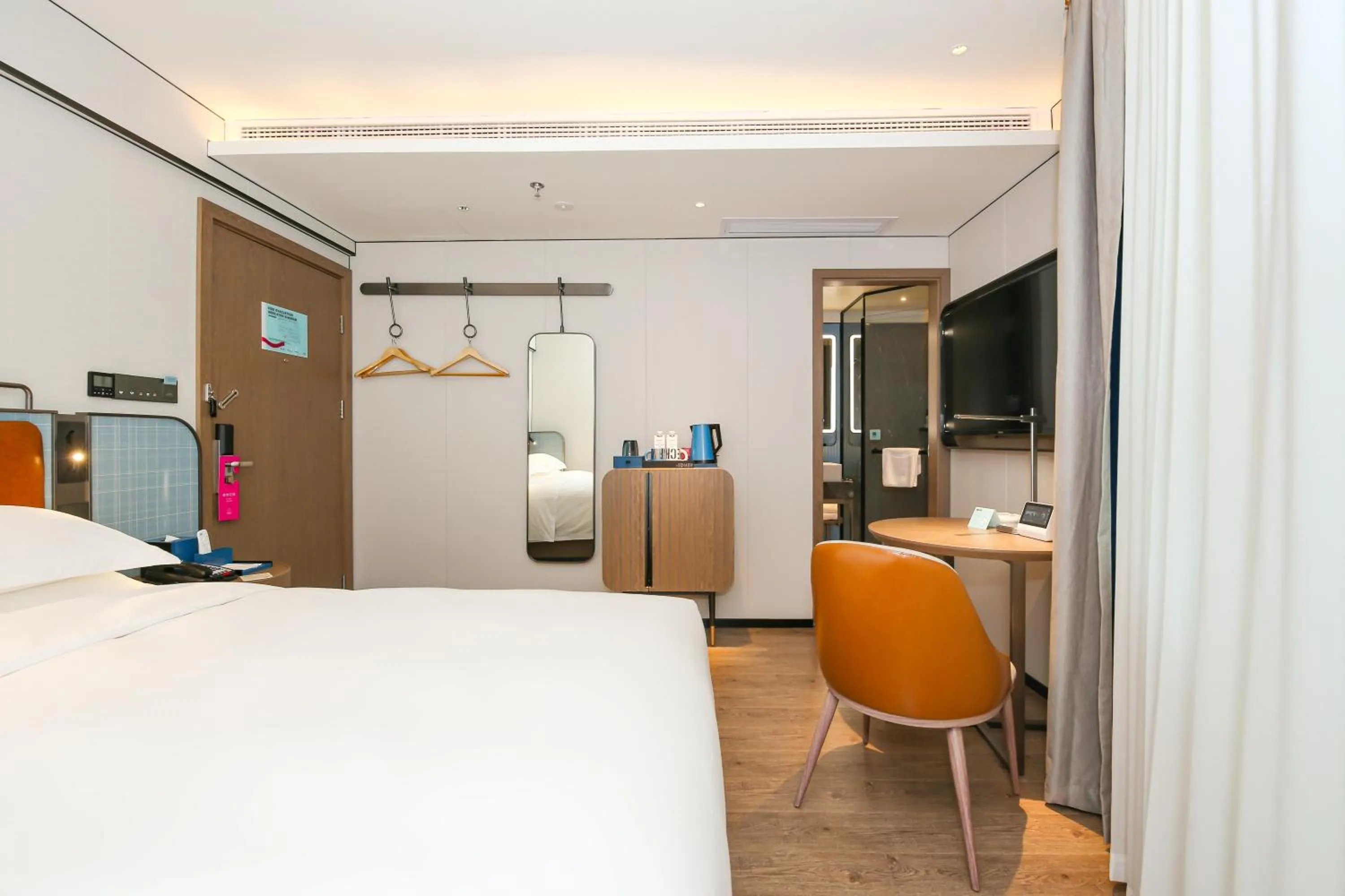 Bed in Echarm Plus International Hotel Guangzhou South Railway Station Zhongcun Metro Station Branch