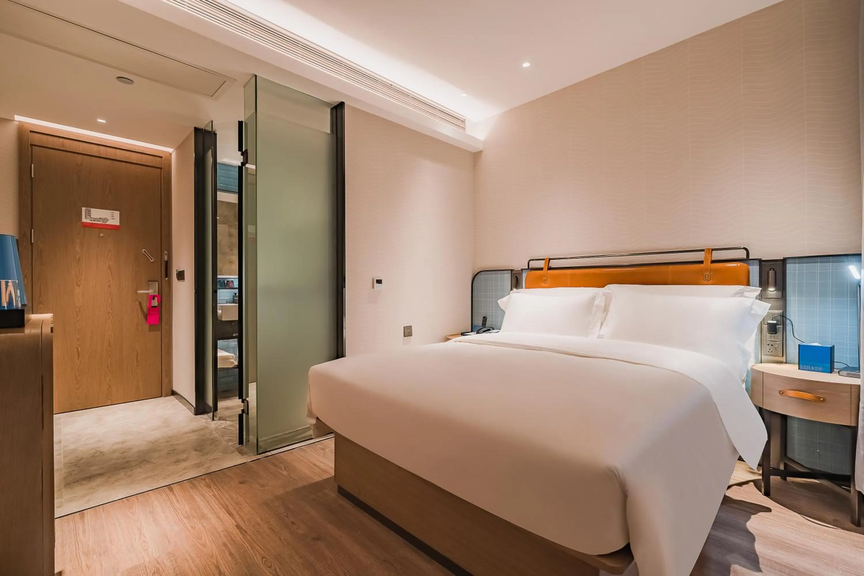 Bed in Echarm Plus International Hotel Guangzhou South Railway Station Zhongcun Metro Station Branch