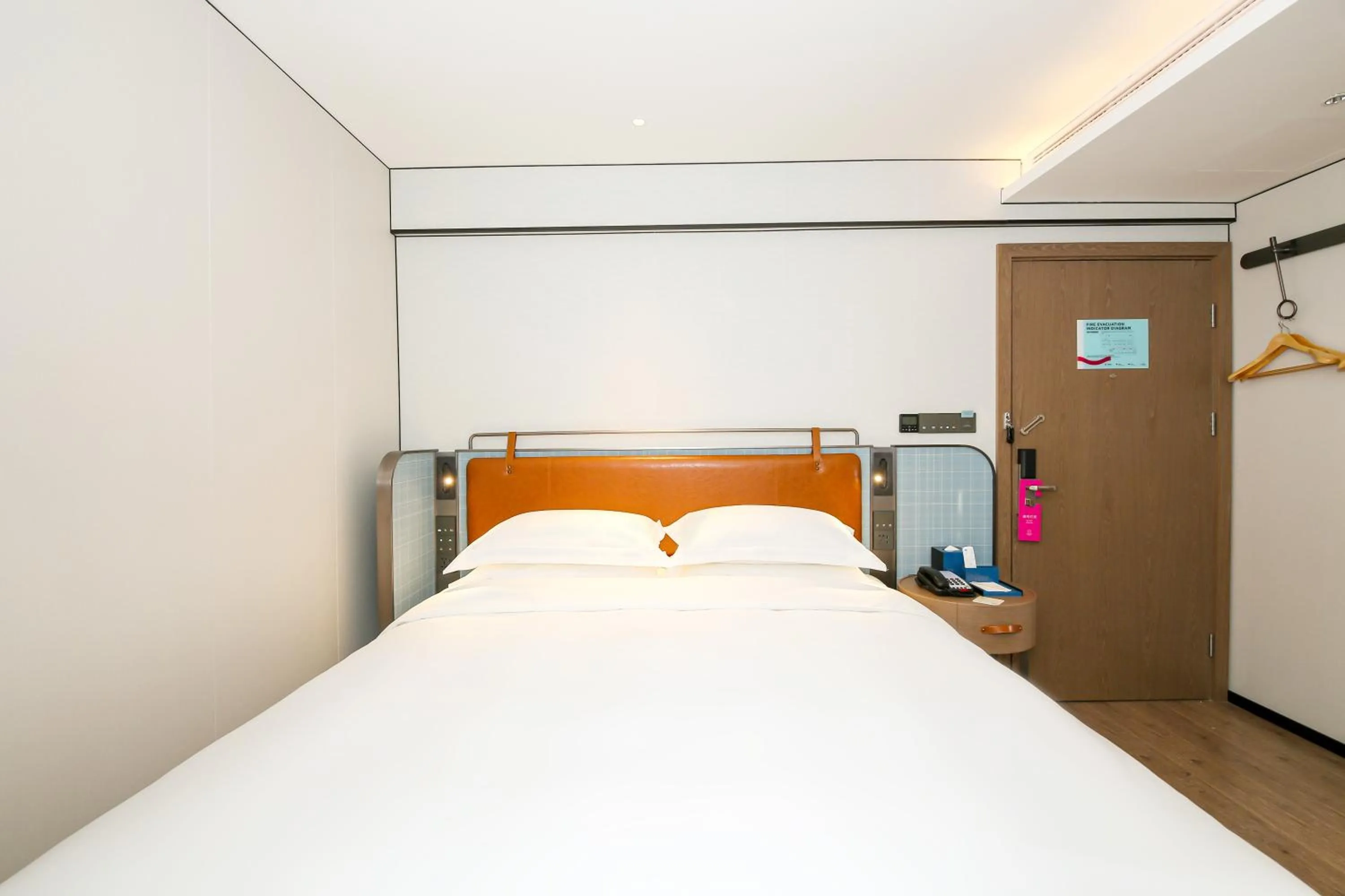 Bed in Echarm Plus International Hotel Guangzhou South Railway Station Zhongcun Metro Station Branch