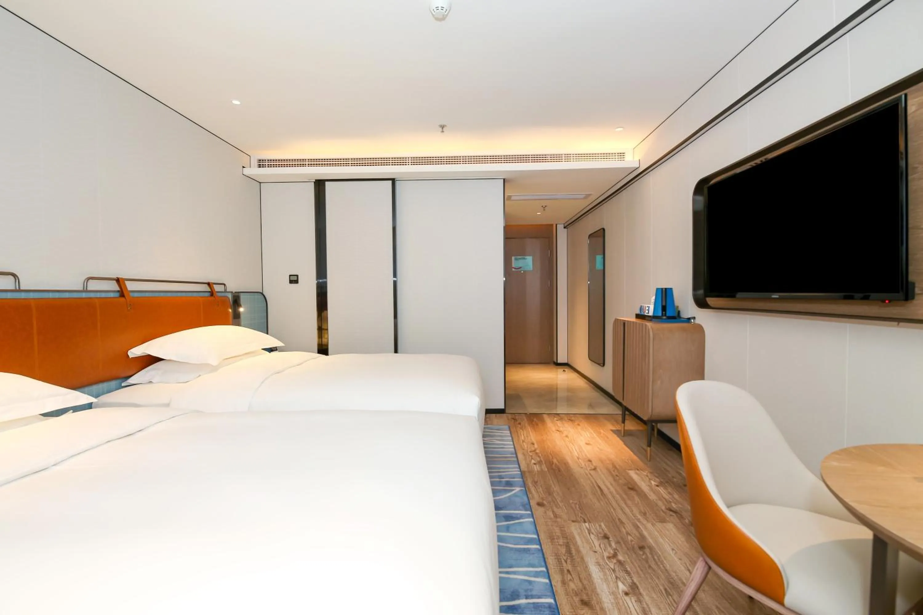 Bed in Echarm Plus International Hotel Guangzhou South Railway Station Zhongcun Metro Station Branch