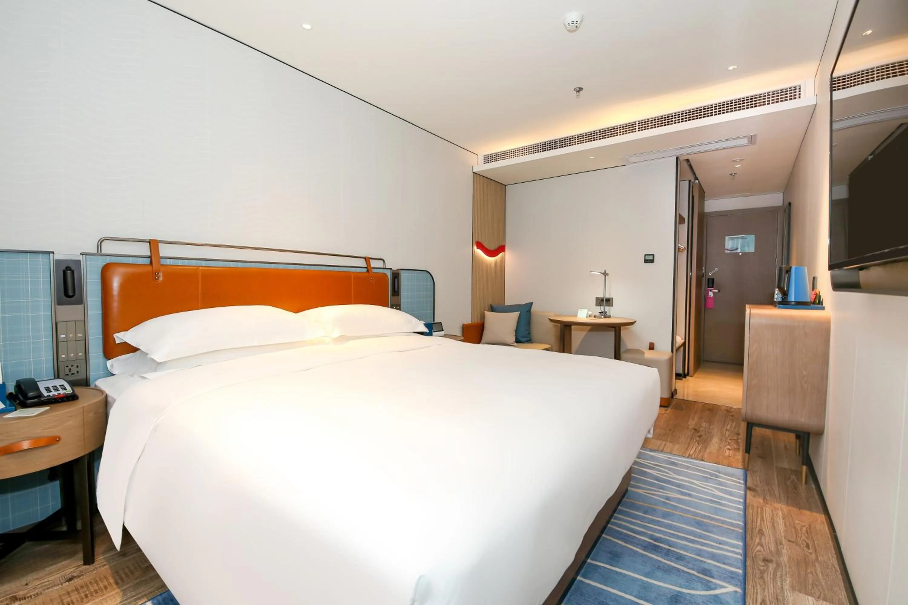 Bed in Echarm Plus International Hotel Guangzhou South Railway Station Zhongcun Metro Station Branch