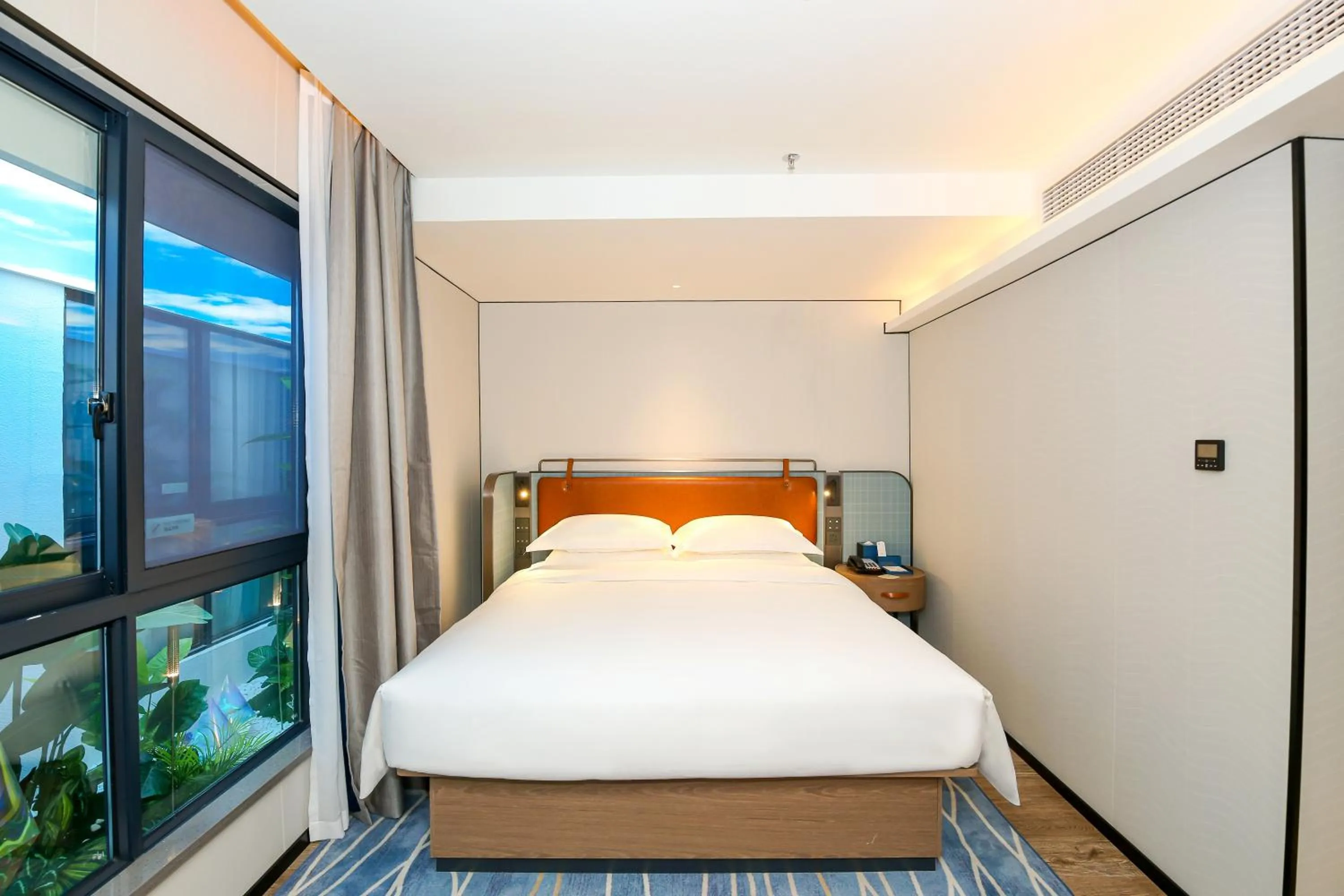 Bed in Echarm Plus International Hotel Guangzhou South Railway Station Zhongcun Metro Station Branch