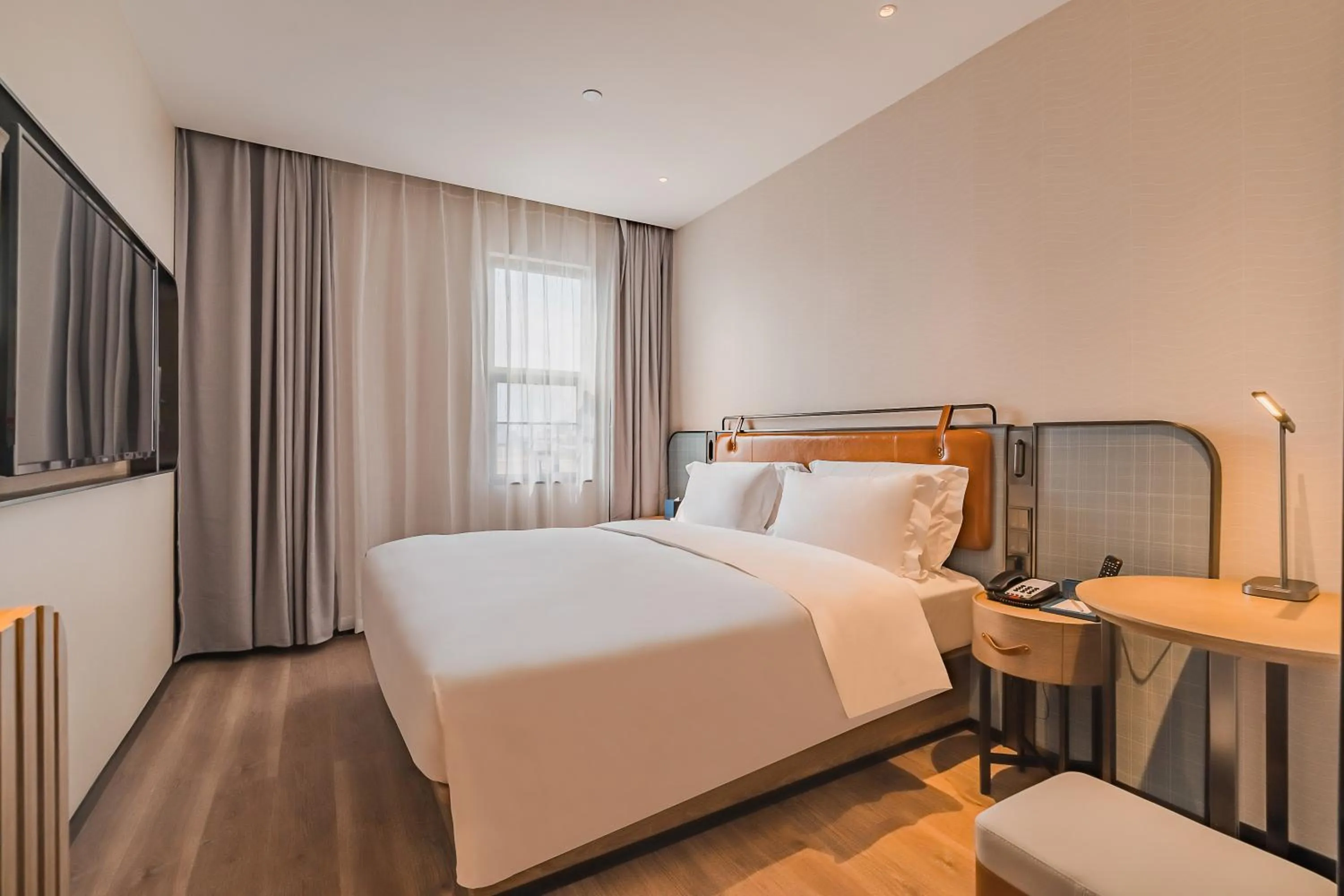 Bed in Echarm Plus International Hotel Guangzhou South Railway Station Zhongcun Metro Station Branch