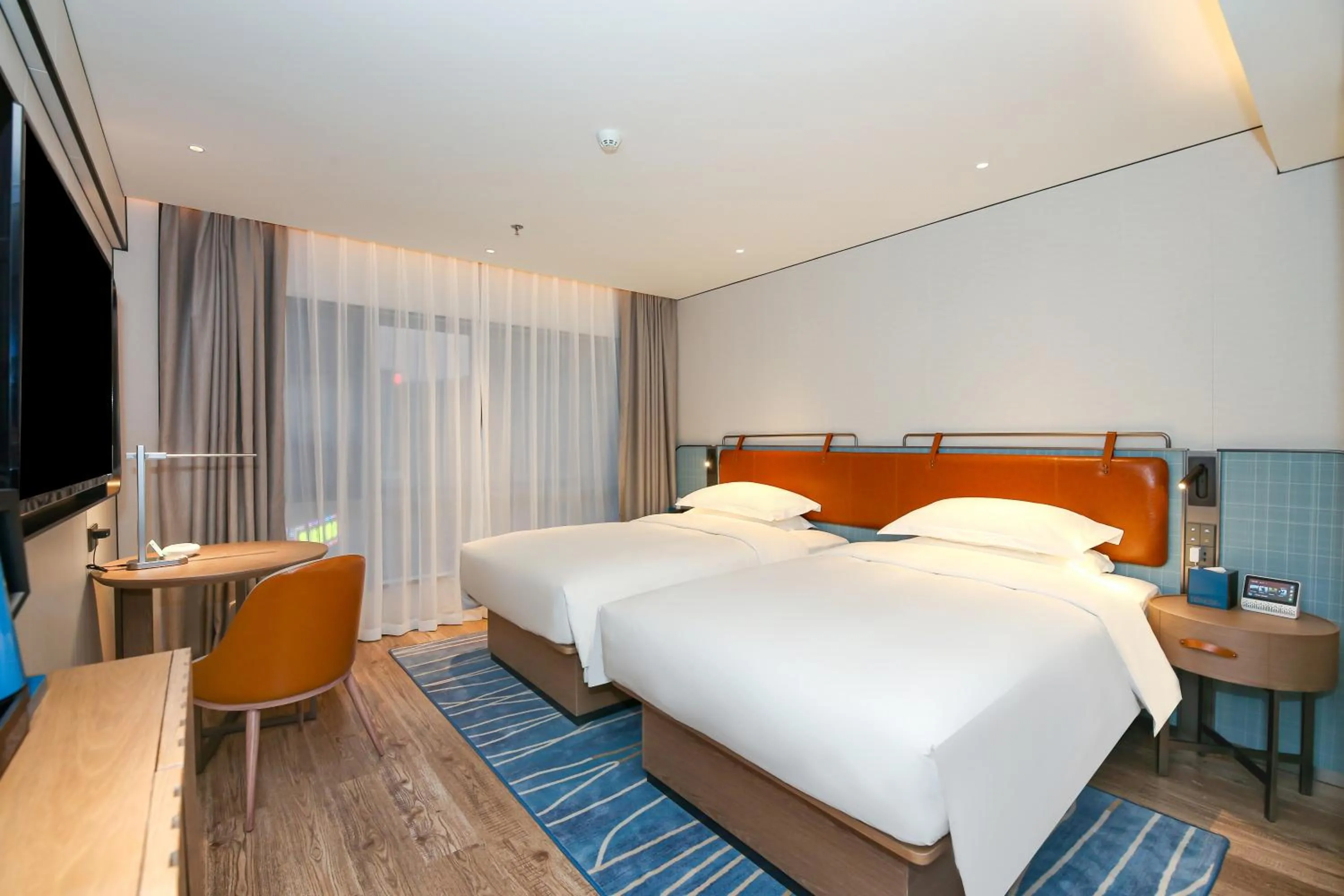 Bed in Echarm Plus International Hotel Guangzhou South Railway Station Zhongcun Metro Station Branch