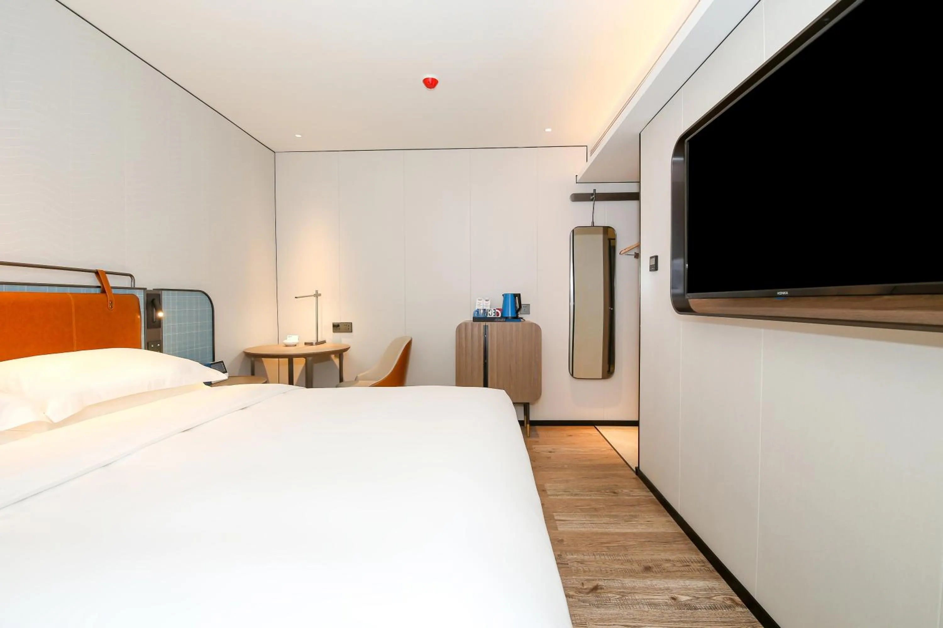 Bed in Echarm Plus International Hotel Guangzhou South Railway Station Zhongcun Metro Station Branch