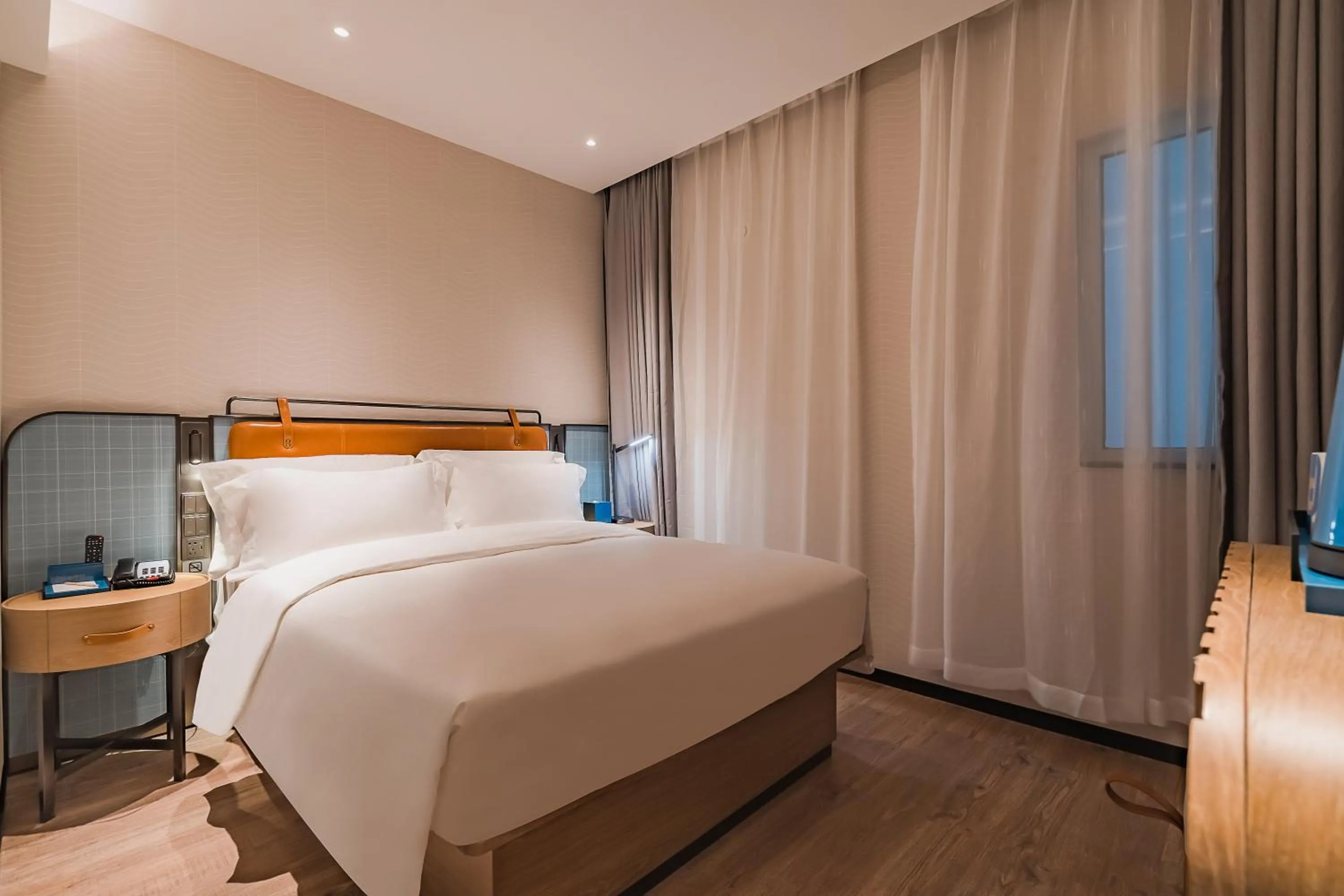 Bed in Echarm Plus International Hotel Guangzhou South Railway Station Zhongcun Metro Station Branch