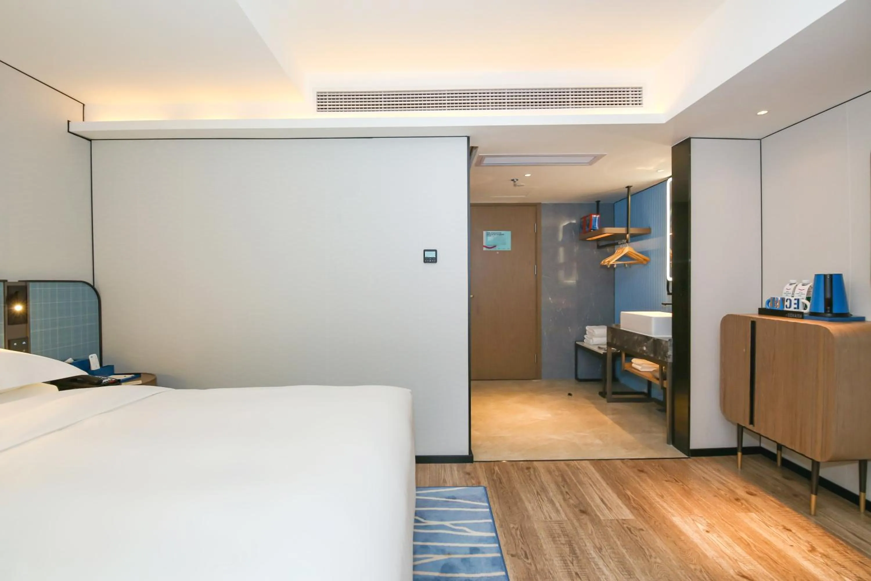 Bed in Echarm Plus International Hotel Guangzhou South Railway Station Zhongcun Metro Station Branch