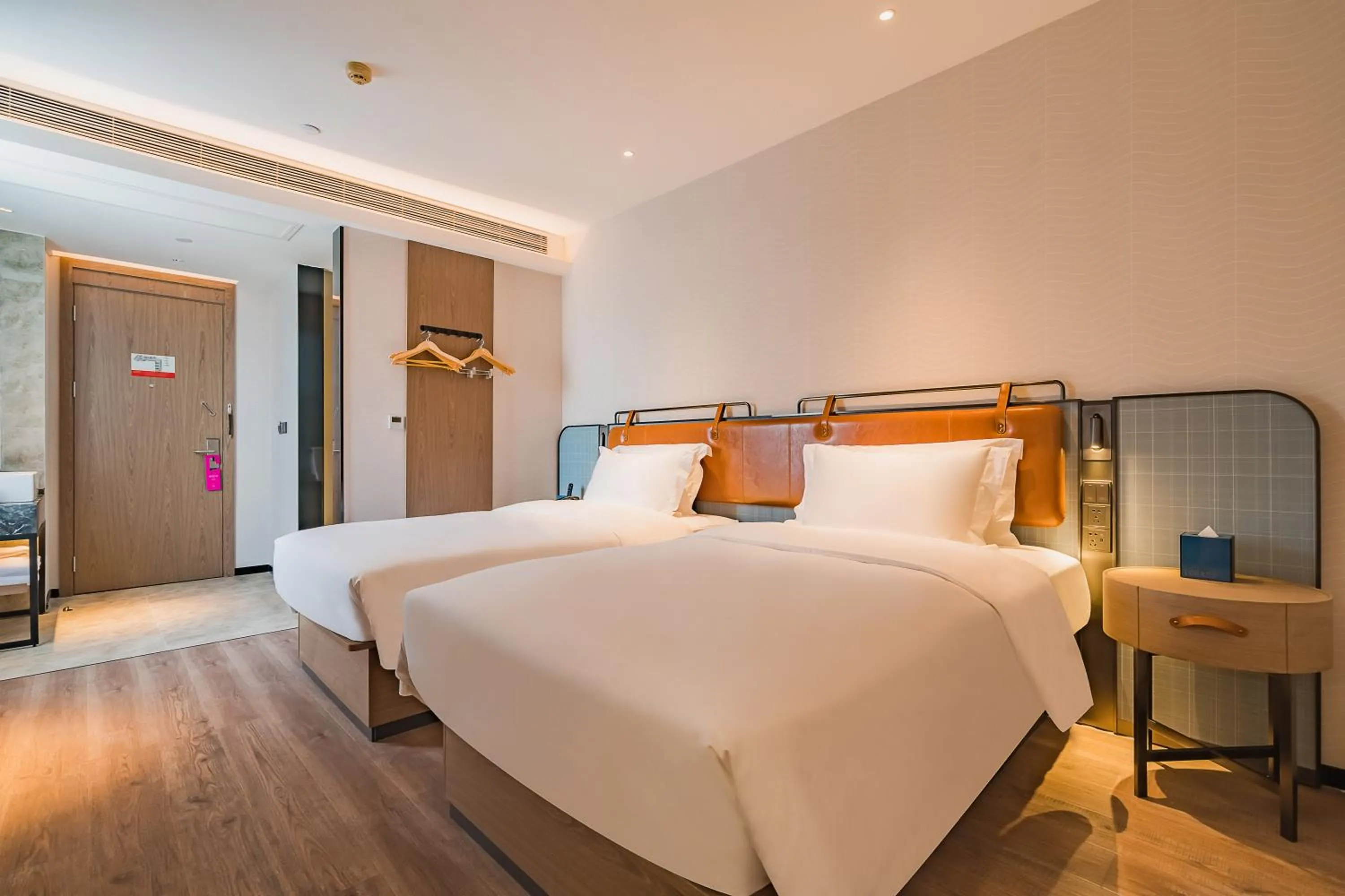 Bed in Echarm Plus International Hotel Guangzhou South Railway Station Zhongcun Metro Station Branch