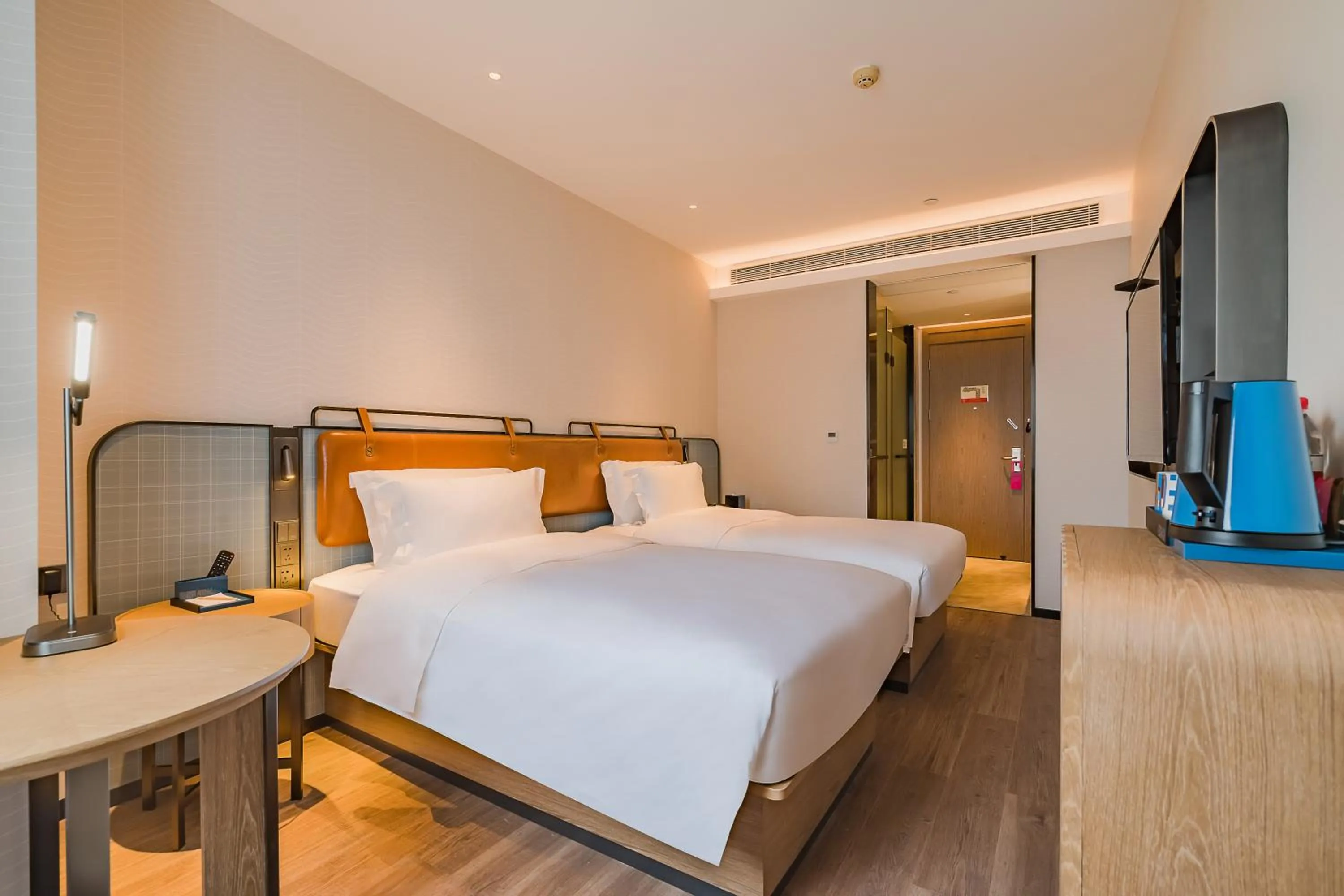 Bed in Echarm Plus International Hotel Guangzhou South Railway Station Zhongcun Metro Station Branch