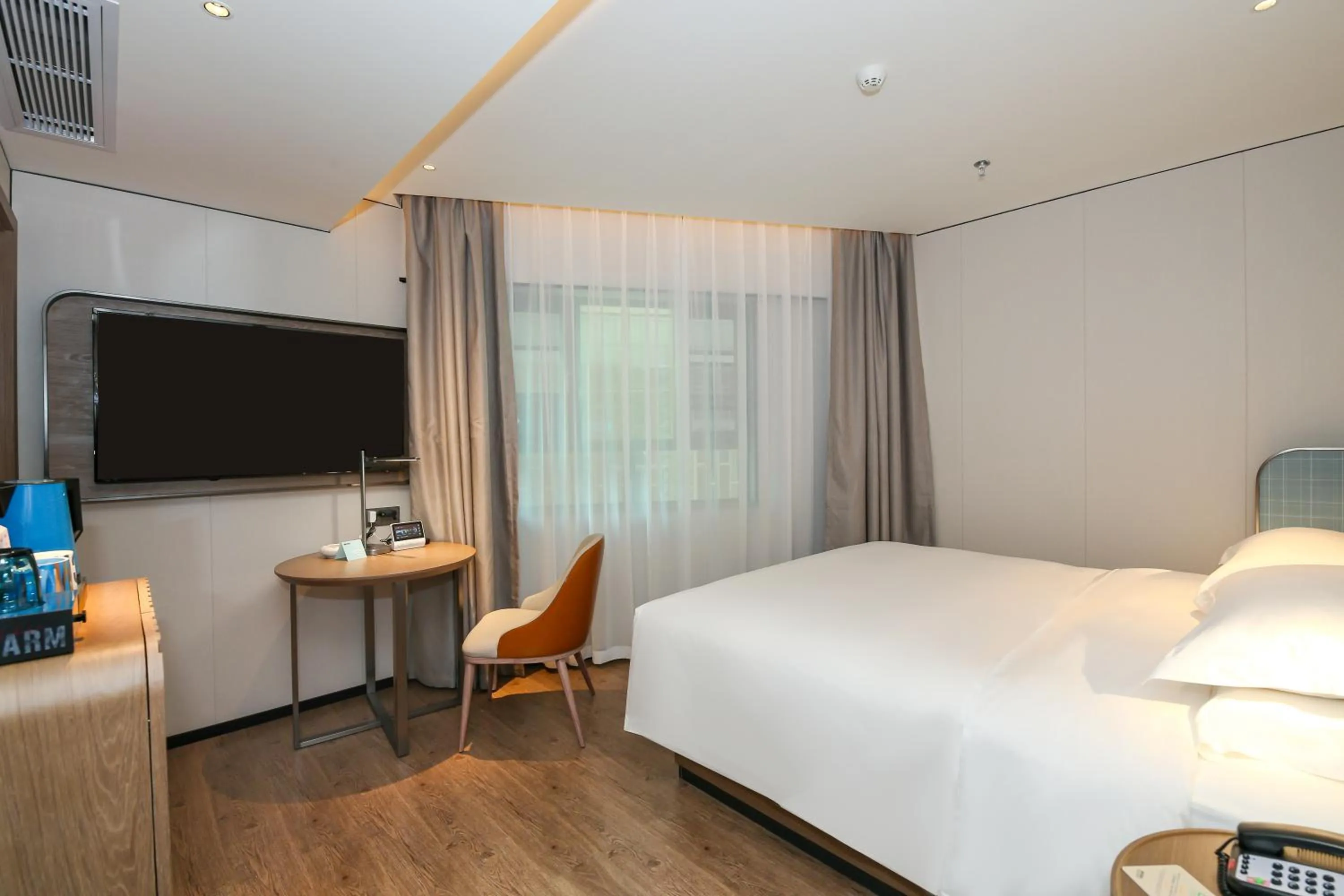 Bed in Echarm Plus International Hotel Guangzhou South Railway Station Zhongcun Metro Station Branch