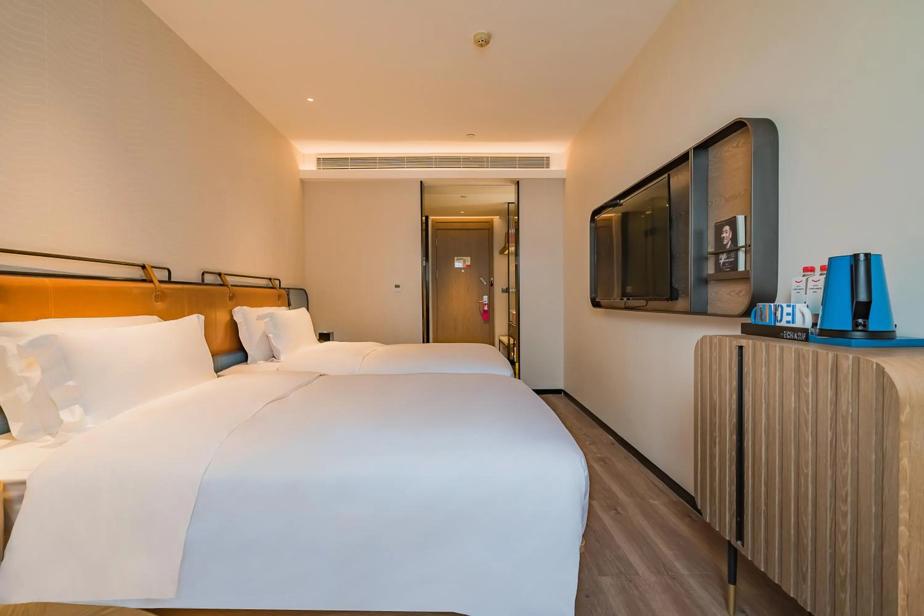 Bed in Echarm Plus International Hotel Guangzhou South Railway Station Zhongcun Metro Station Branch