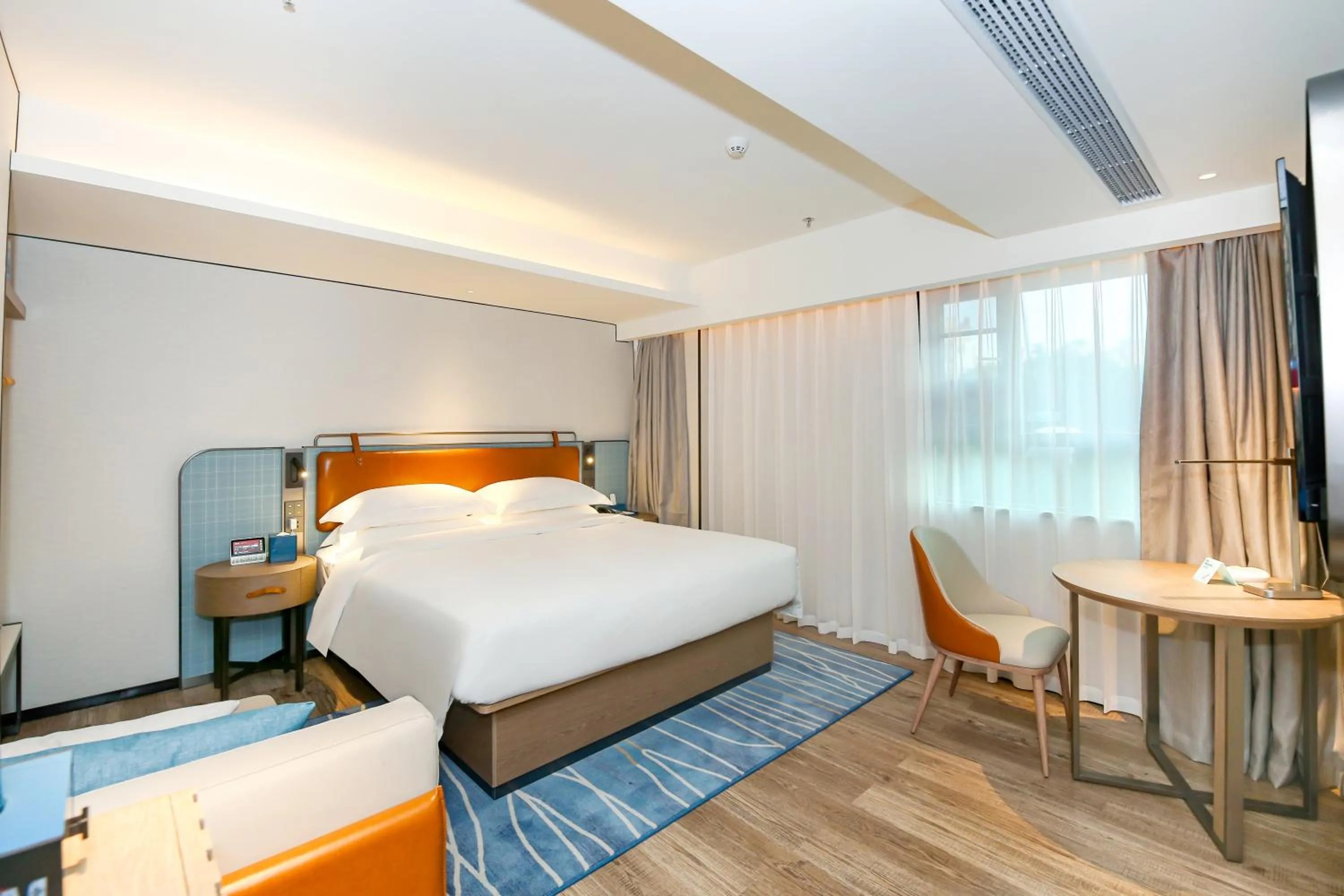 Bed in Echarm Plus International Hotel Guangzhou South Railway Station Zhongcun Metro Station Branch