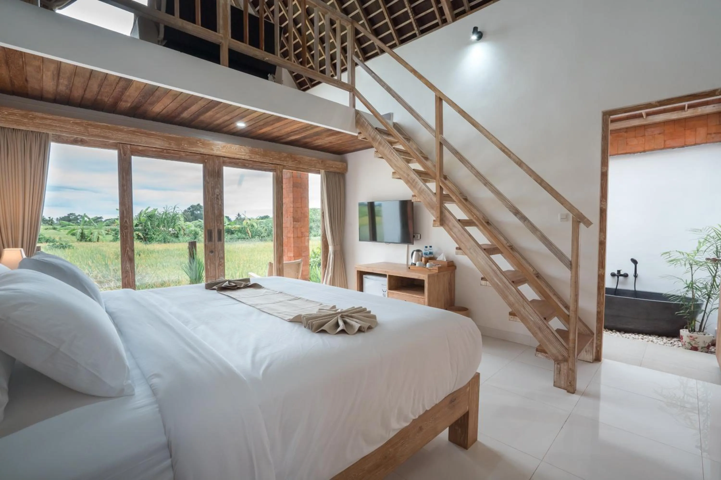 Photo of the whole room, Bed in Dewi Sri Villa Ubud by Mahaputra
