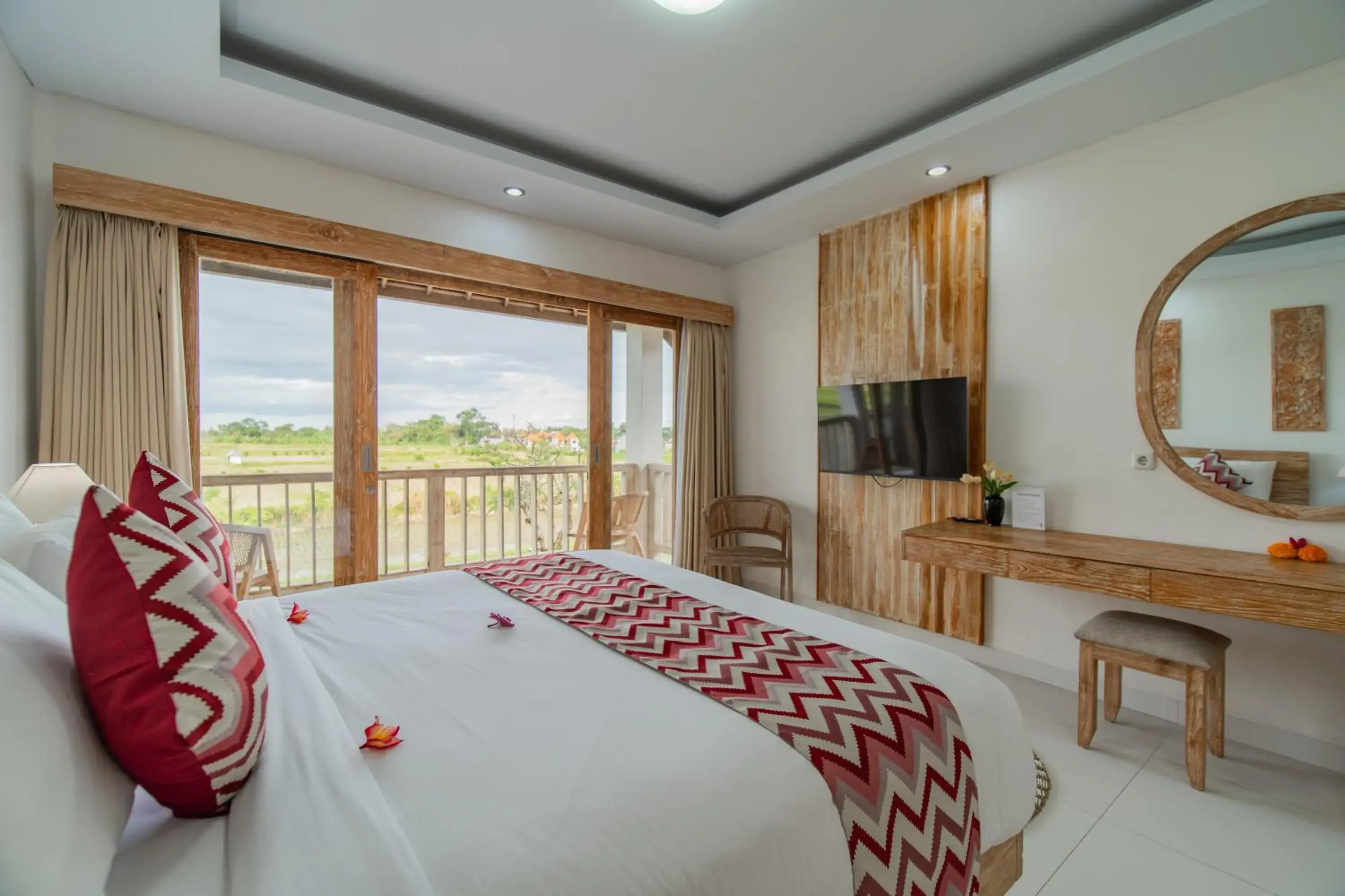 Deluxe Room with Rice field view in Dewi Sri Villa Ubud by Mahaputra Deluxe Room with Rice field view in Dewi Sri Villa Ubud by Mahaputra