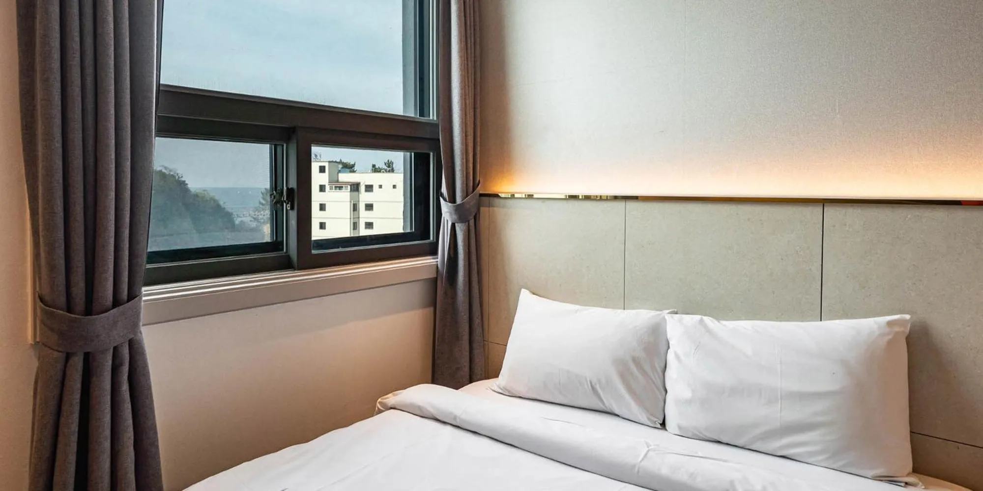 Bed in Sokcho Ritz Hotel