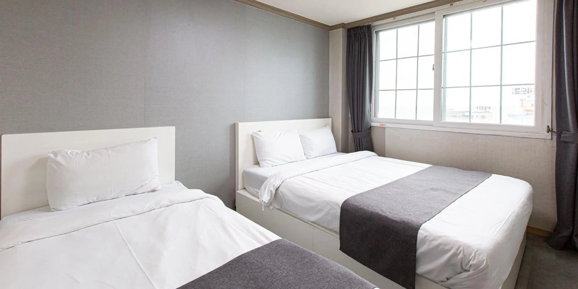 Bed in Sokcho Ritz Hotel