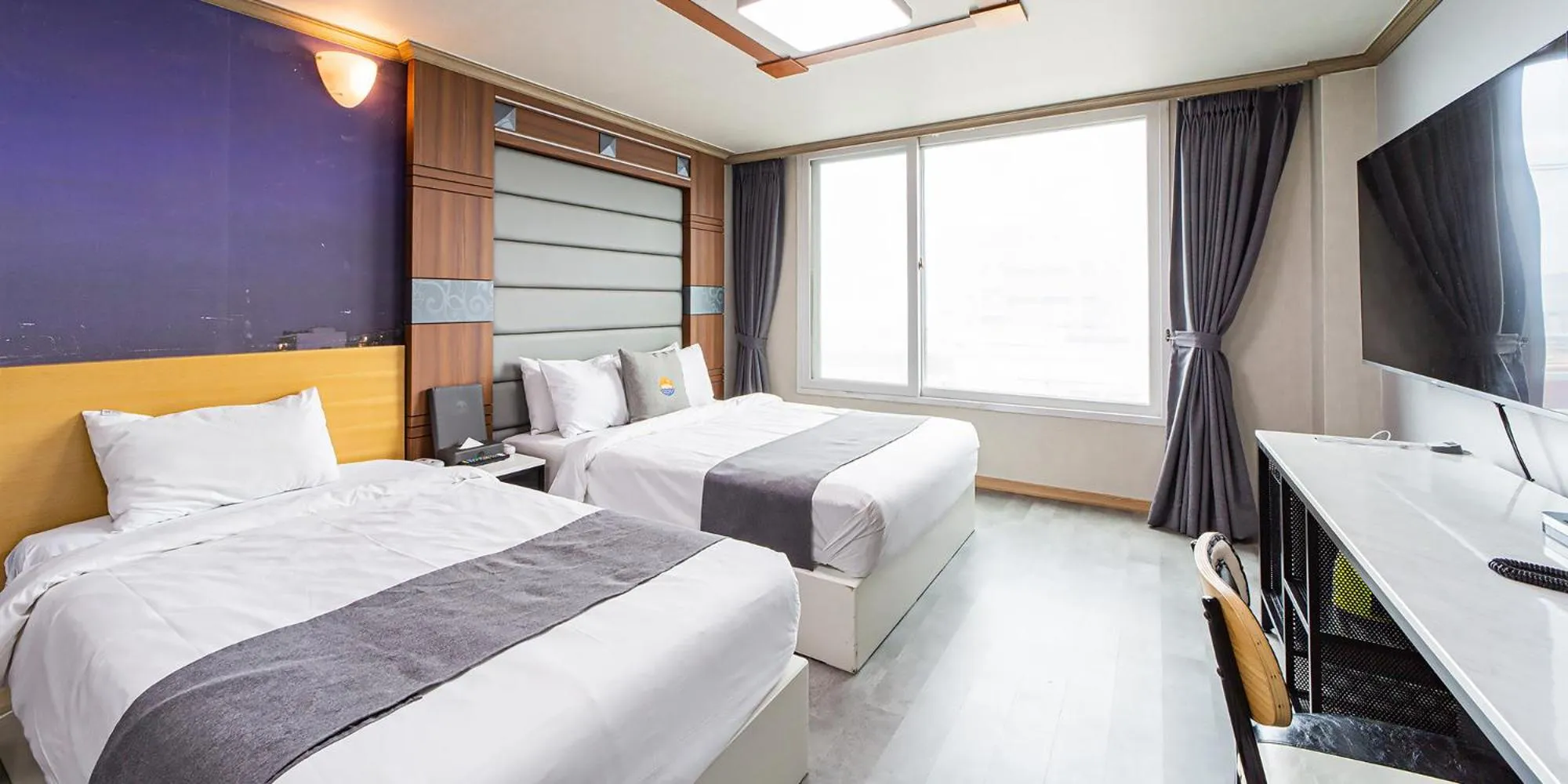 Bed in Sokcho Ritz Hotel