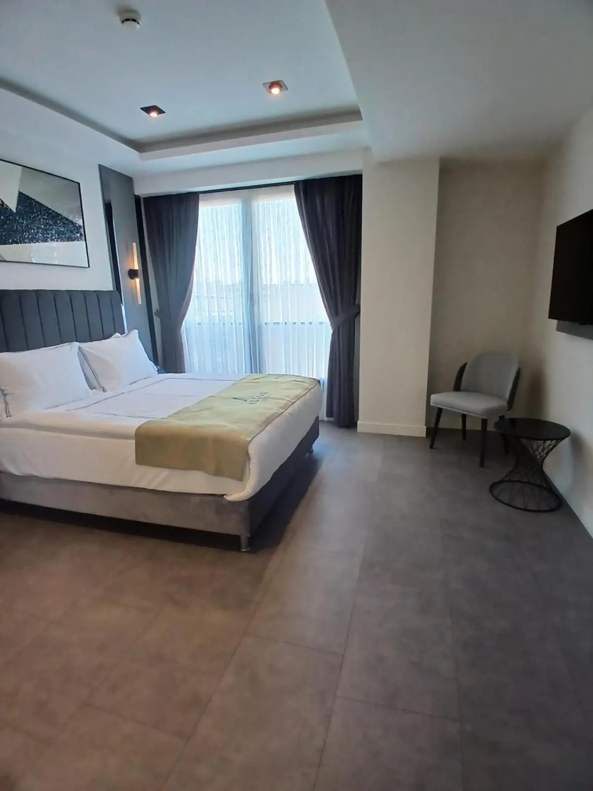 Bed in Alion Hotel