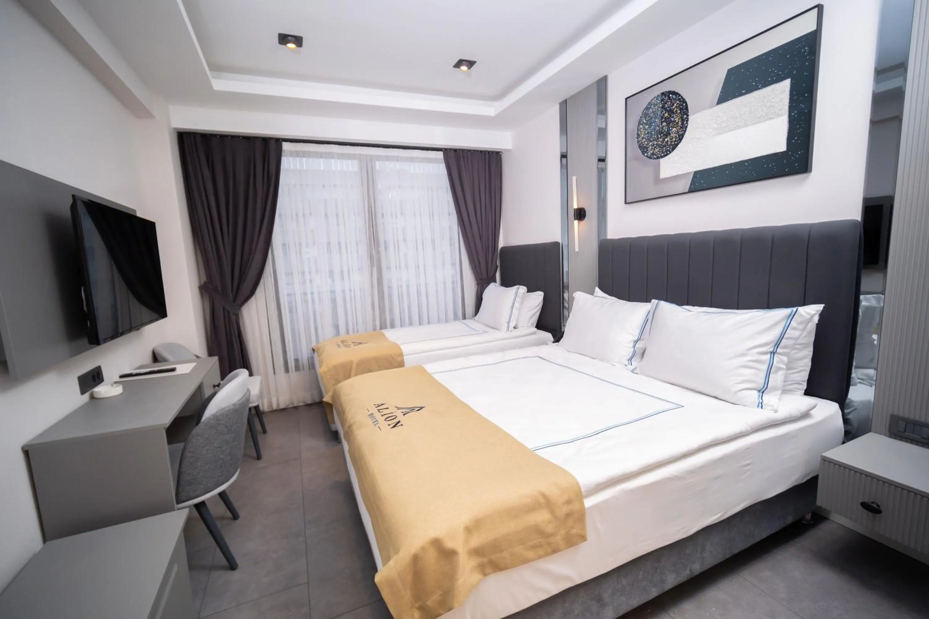 Bed in Alion Hotel