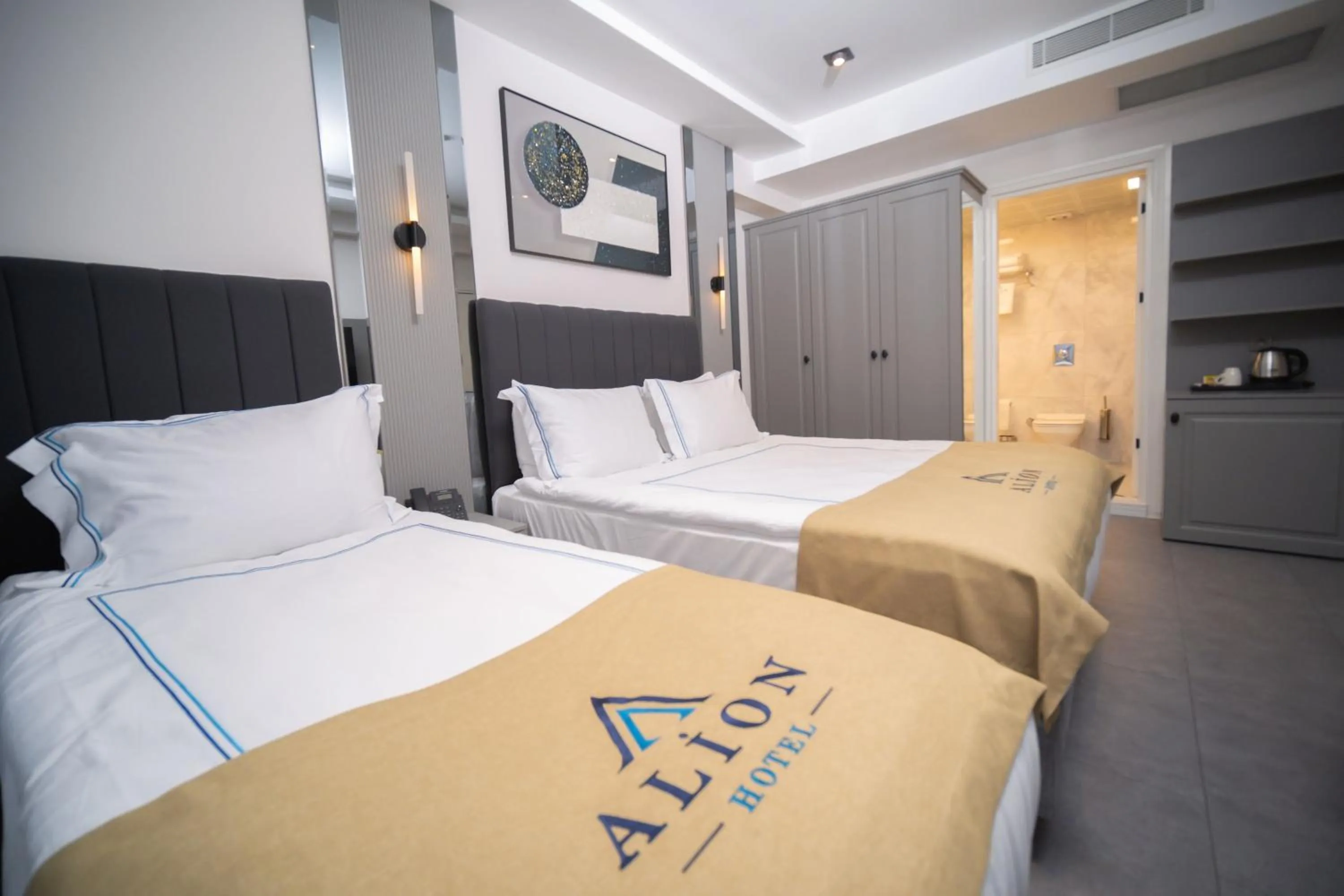 Bed in Alion Hotel