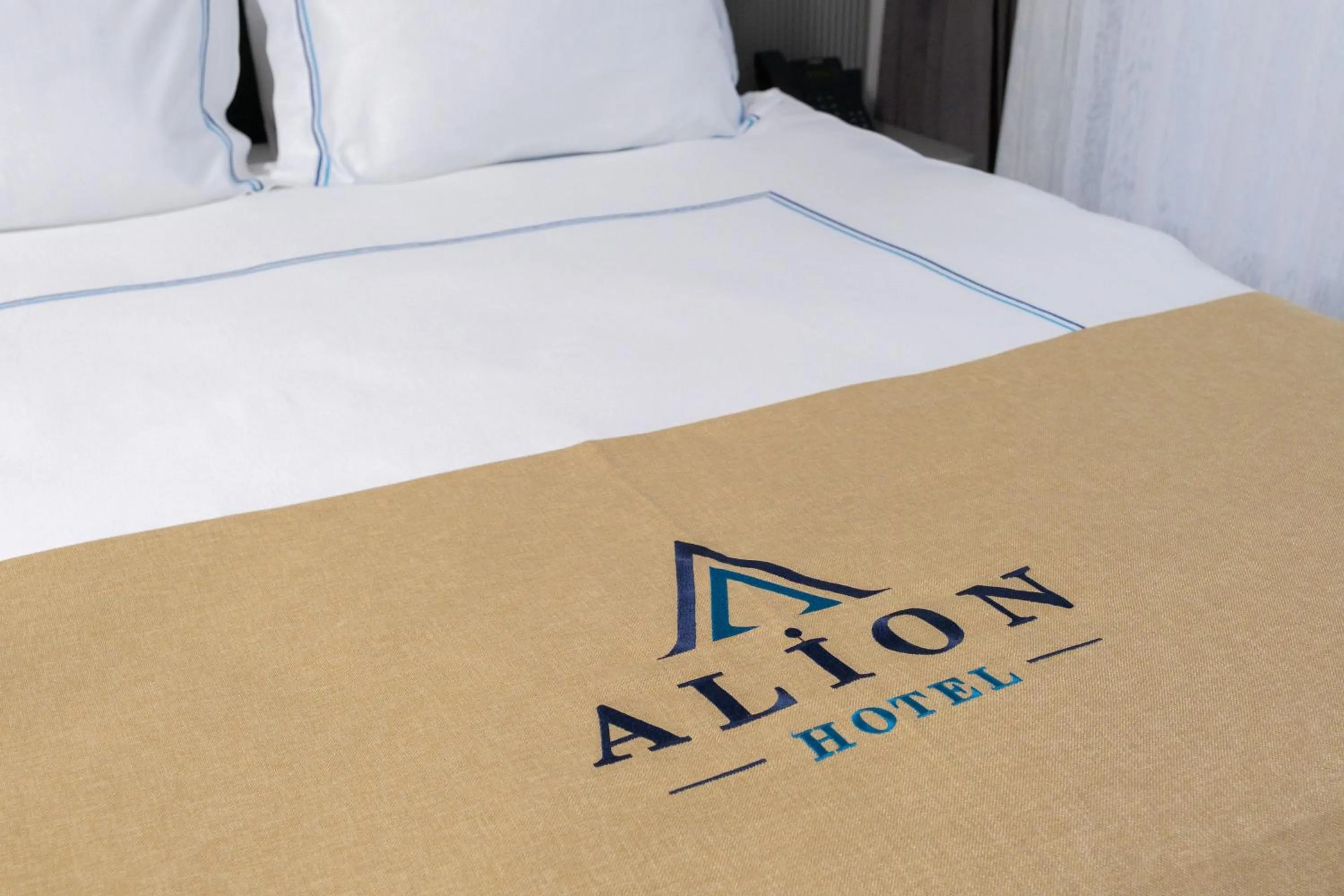 Bed in Alion Hotel