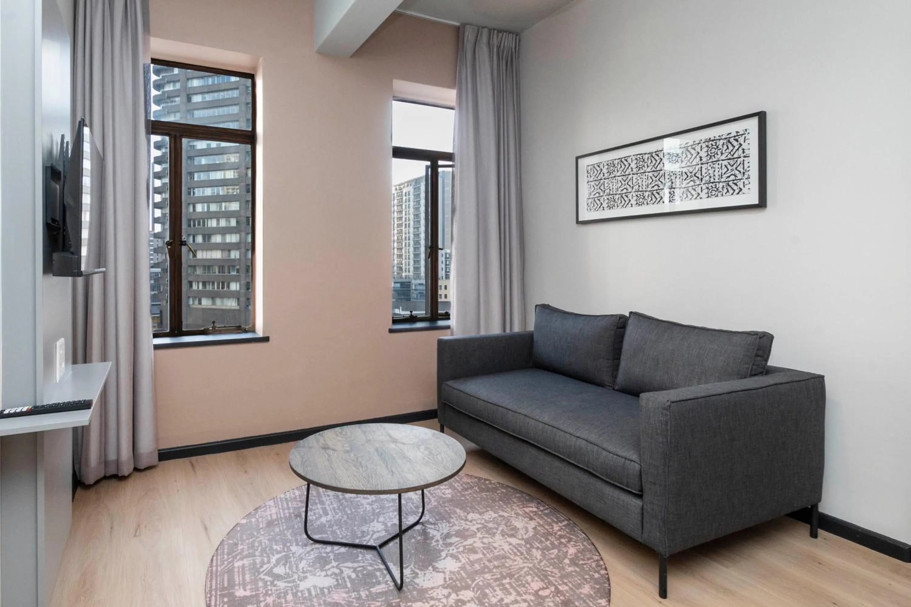 Seating area in HAVN Aparthotel by Totalstay