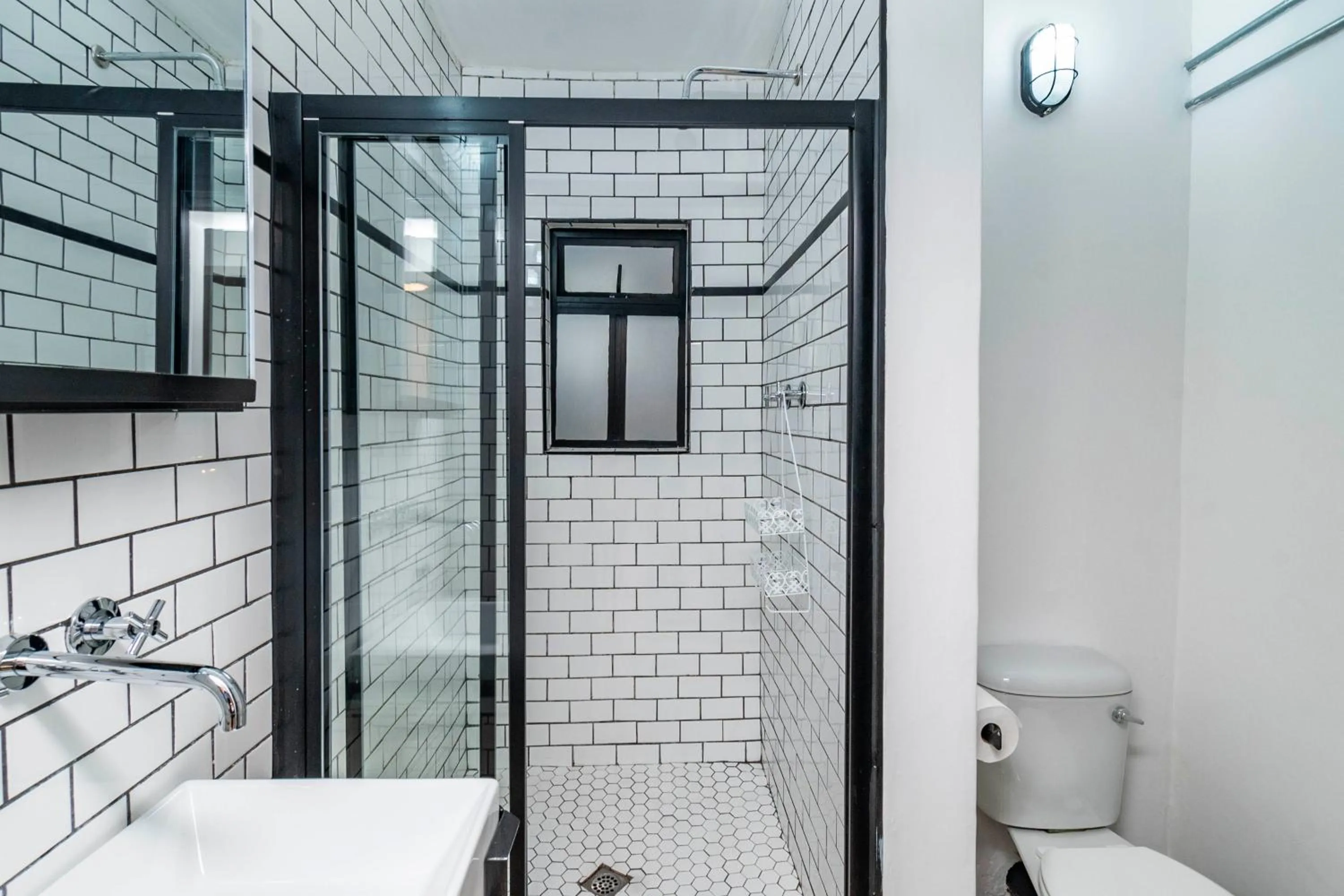 Bathroom in HAVN Aparthotel by Totalstay