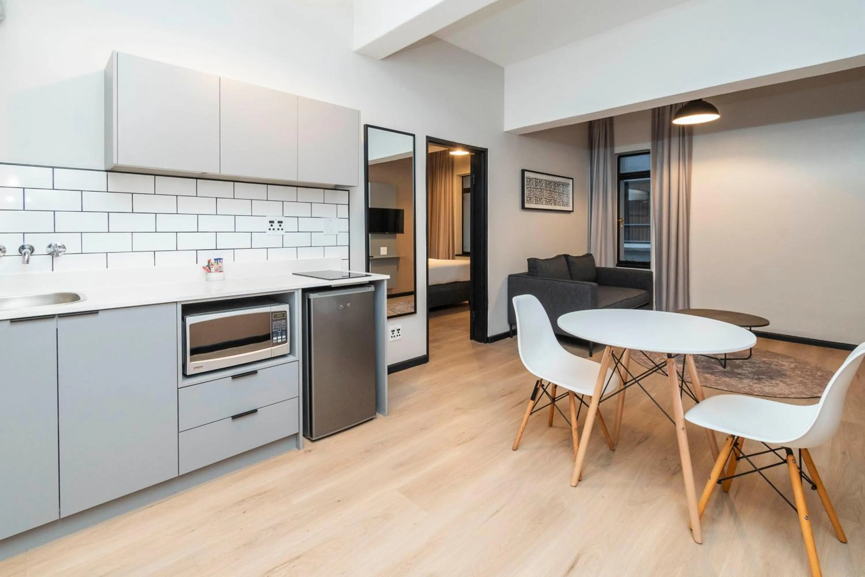 Kitchen or kitchenette in HAVN Aparthotel by Totalstay