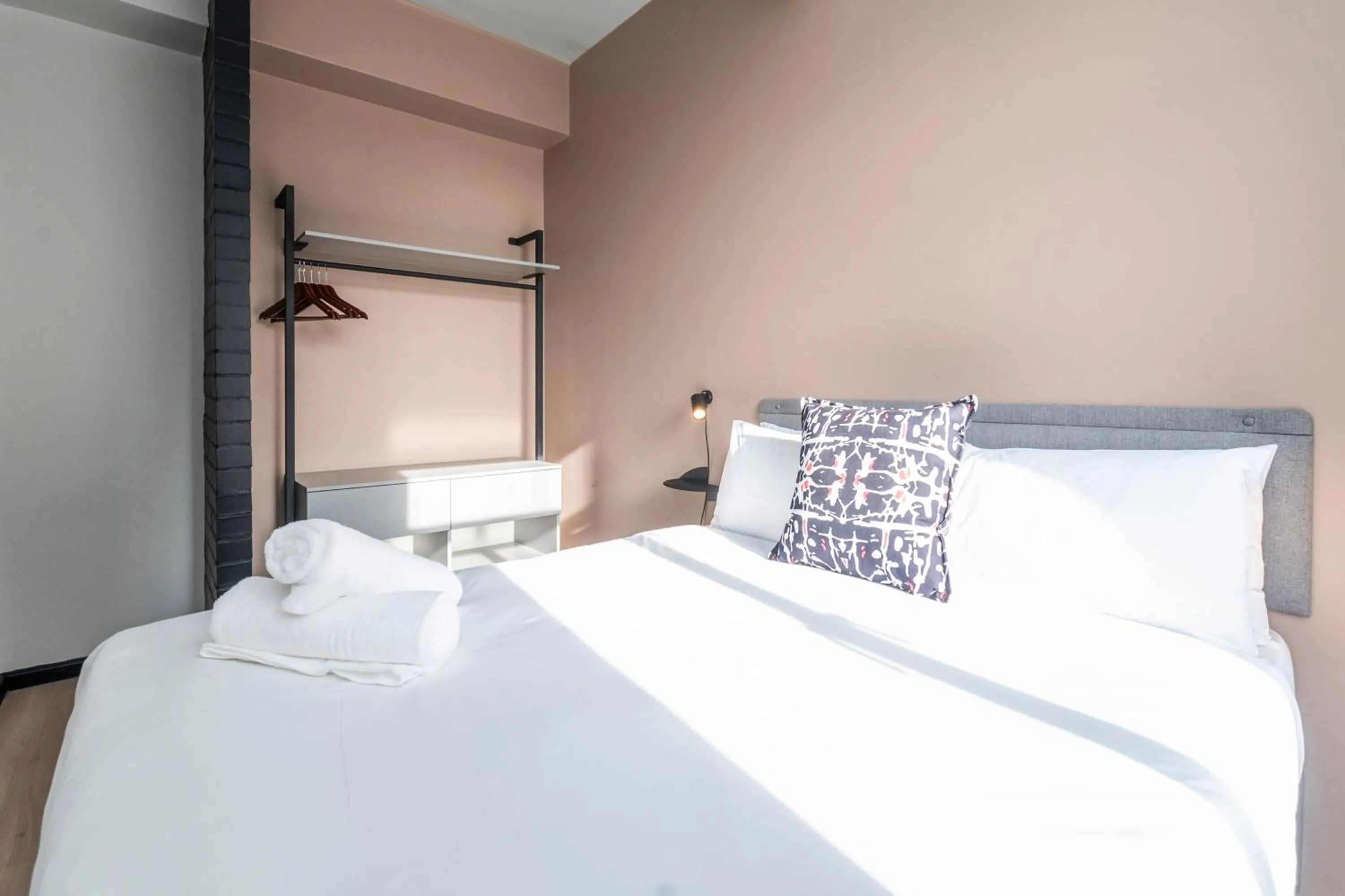 Bed in HAVN Aparthotel by Totalstay