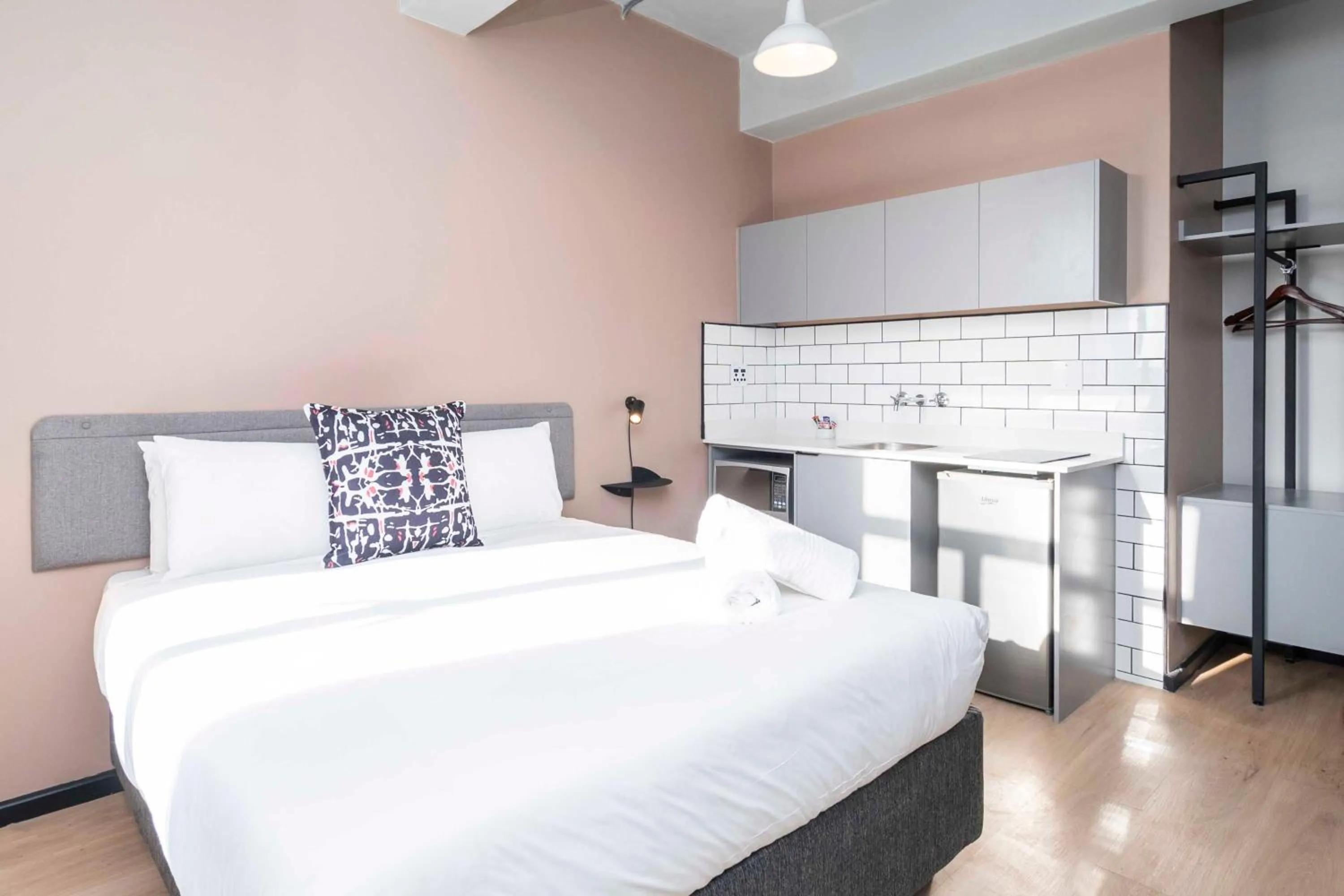 Bed in HAVN Aparthotel by Totalstay