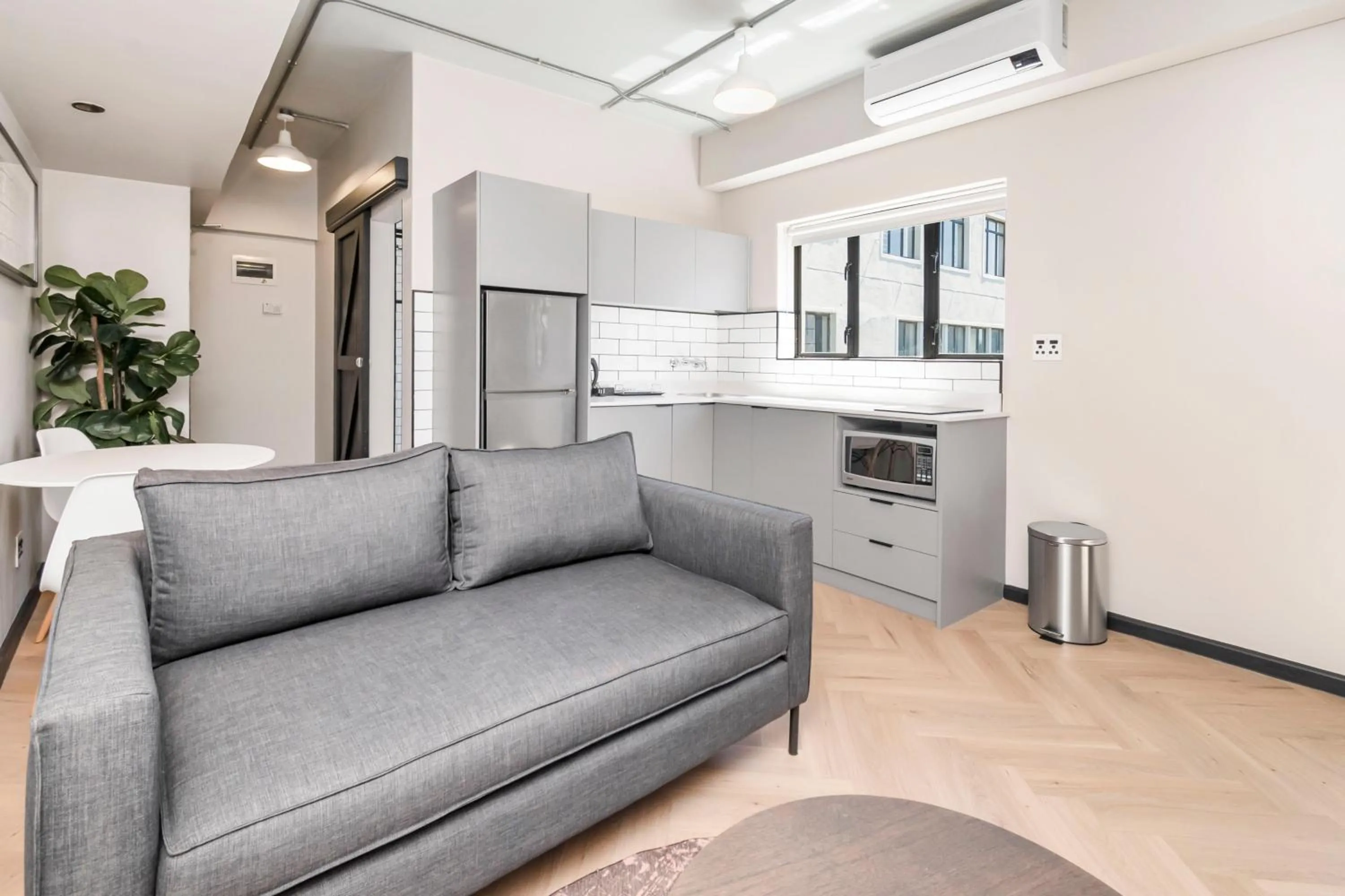 Seating area in HAVN Aparthotel by Totalstay