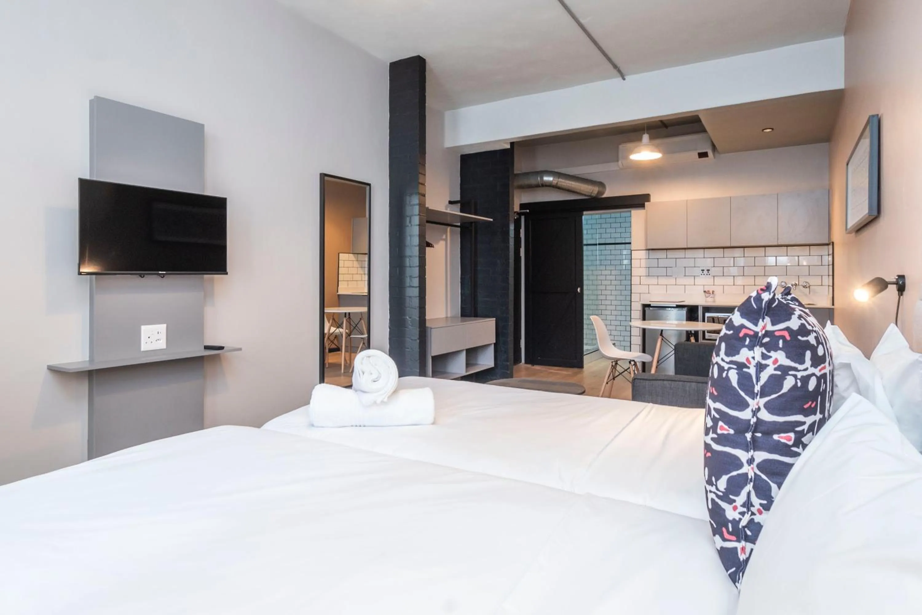 Bed in HAVN Aparthotel by Totalstay