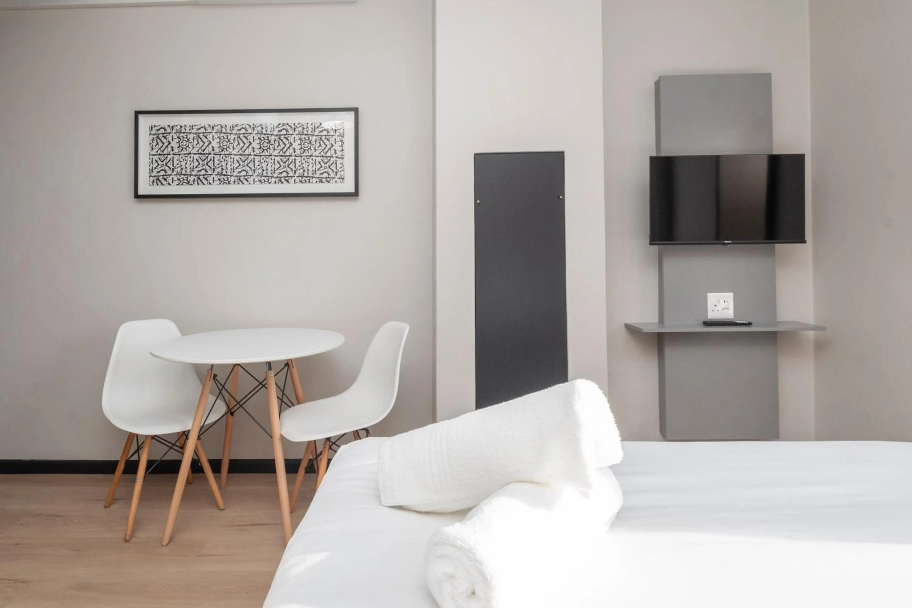 Bed in HAVN Aparthotel by Totalstay