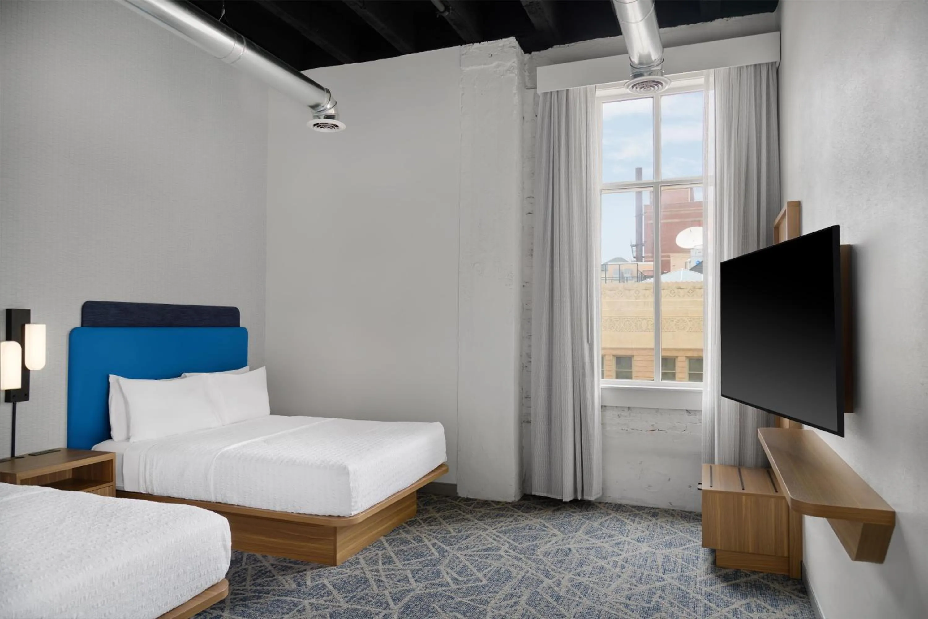 Bed in Hampton Inn by Hilton Lincoln Downtown