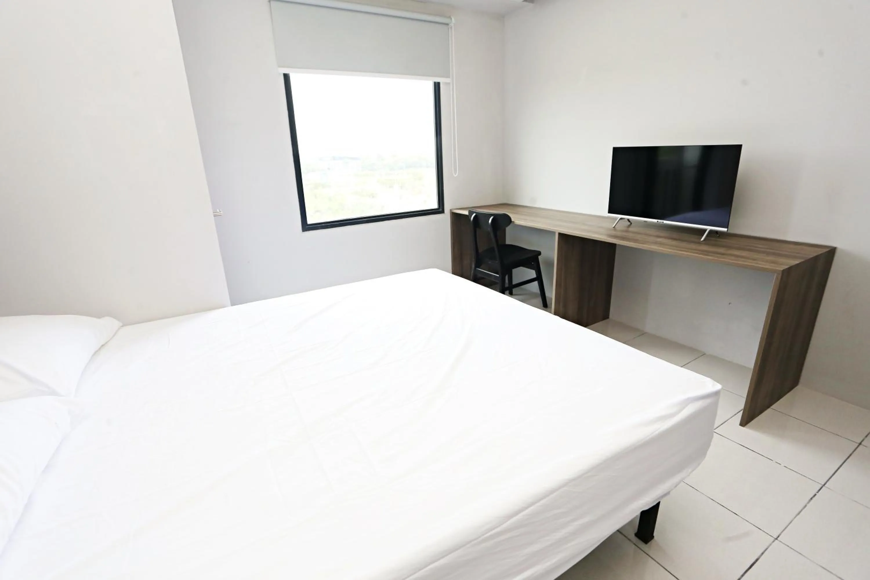 Bed in Nusantara Rooms Riverdale By Reccoma